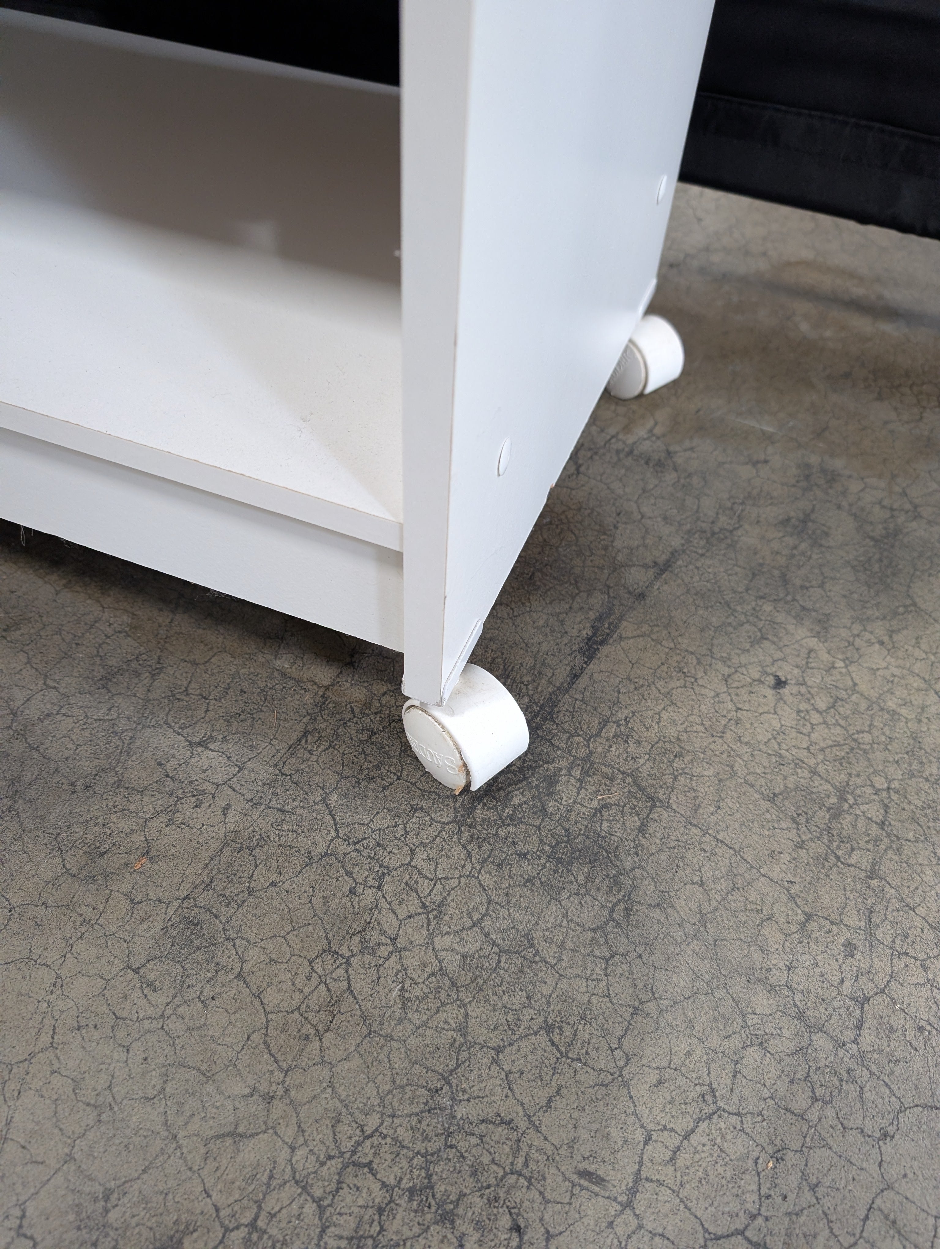 Compact White Mobile Storage Unit with Open Shelves