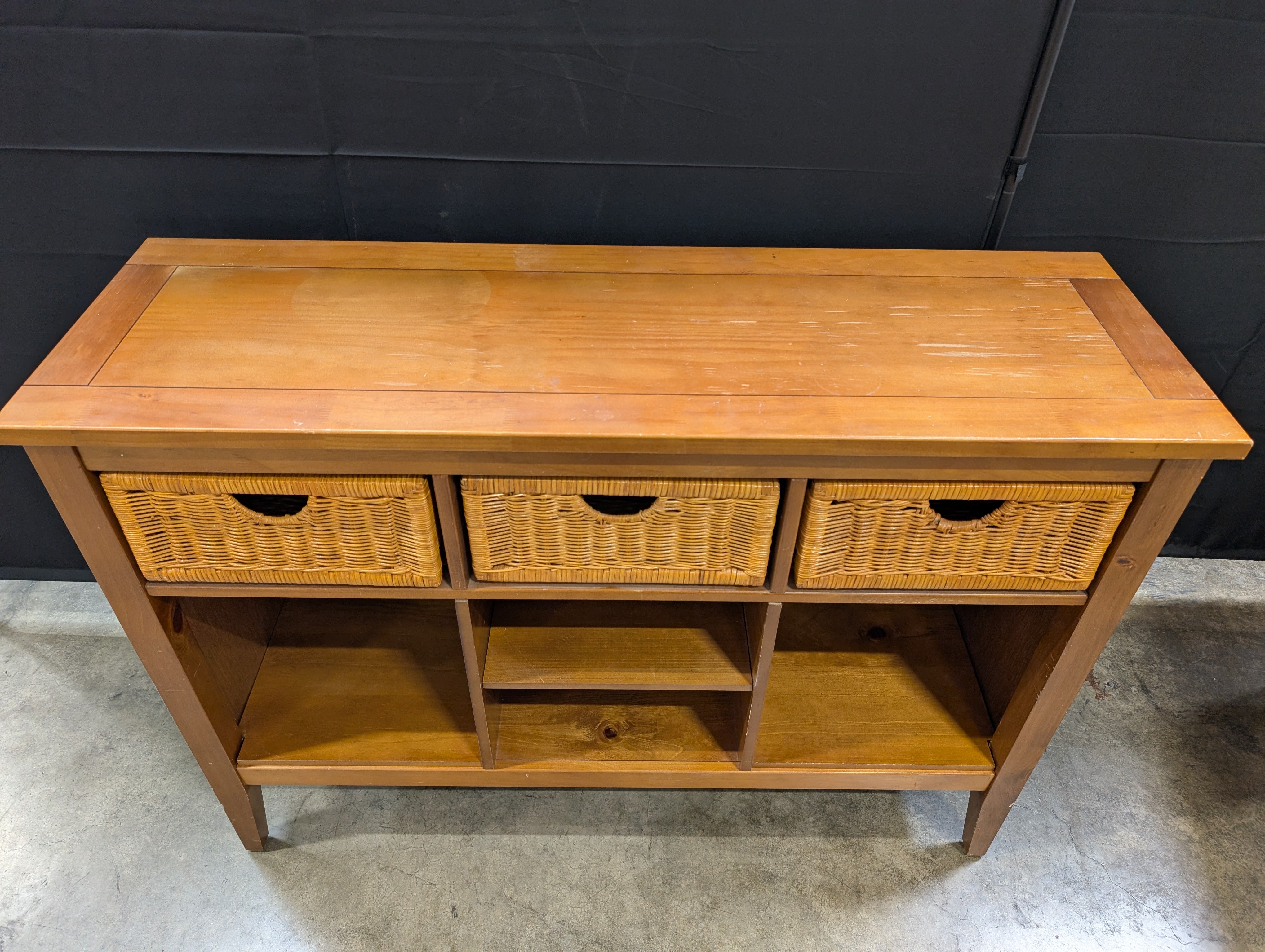 Wooden Console Table with Wicker Baskets and Open Shelves