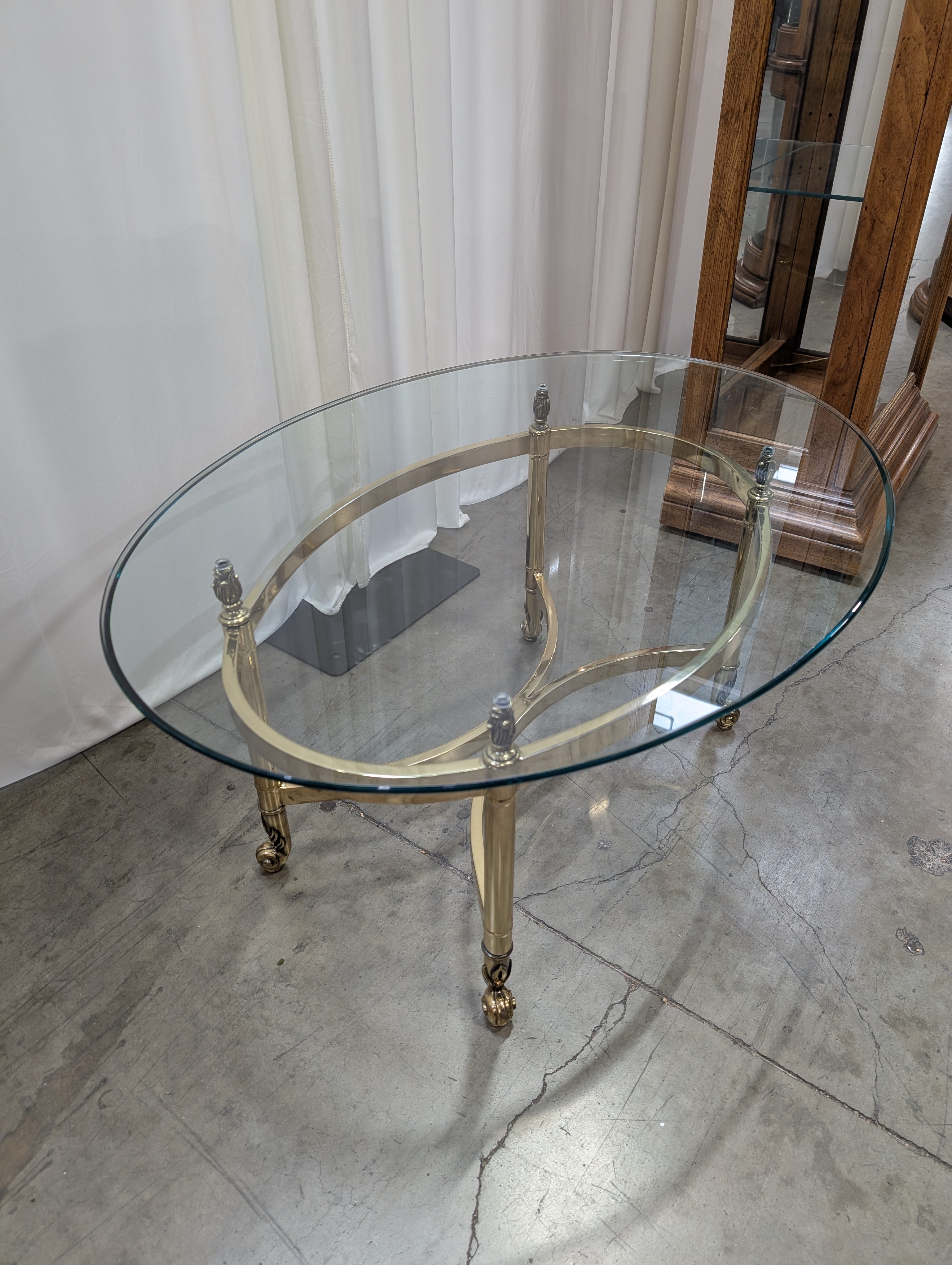 Oval Glass Top Coffee Table with Casters