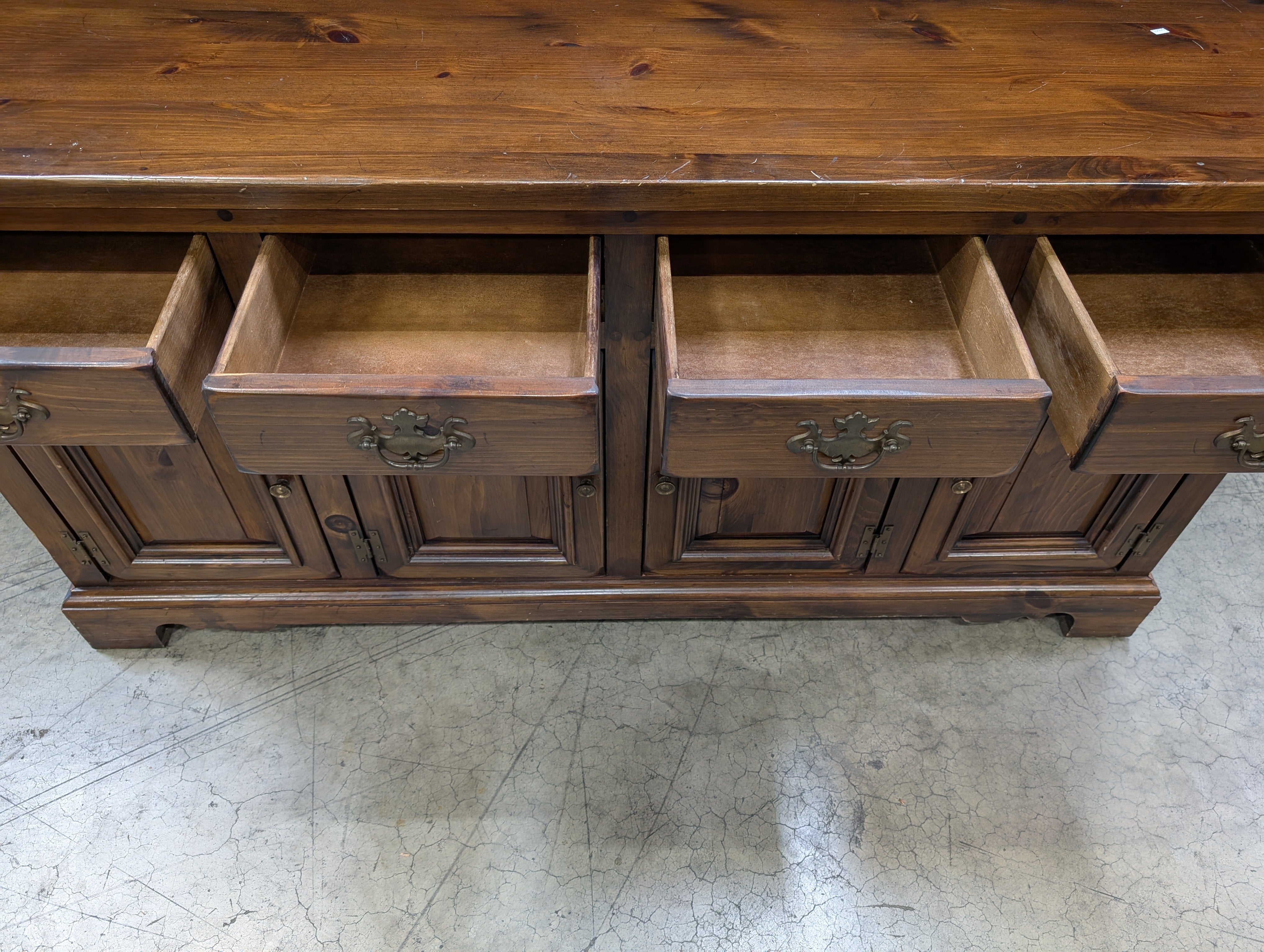 Rustic Dark Stained Wood Sideboard with Ornate Hardware