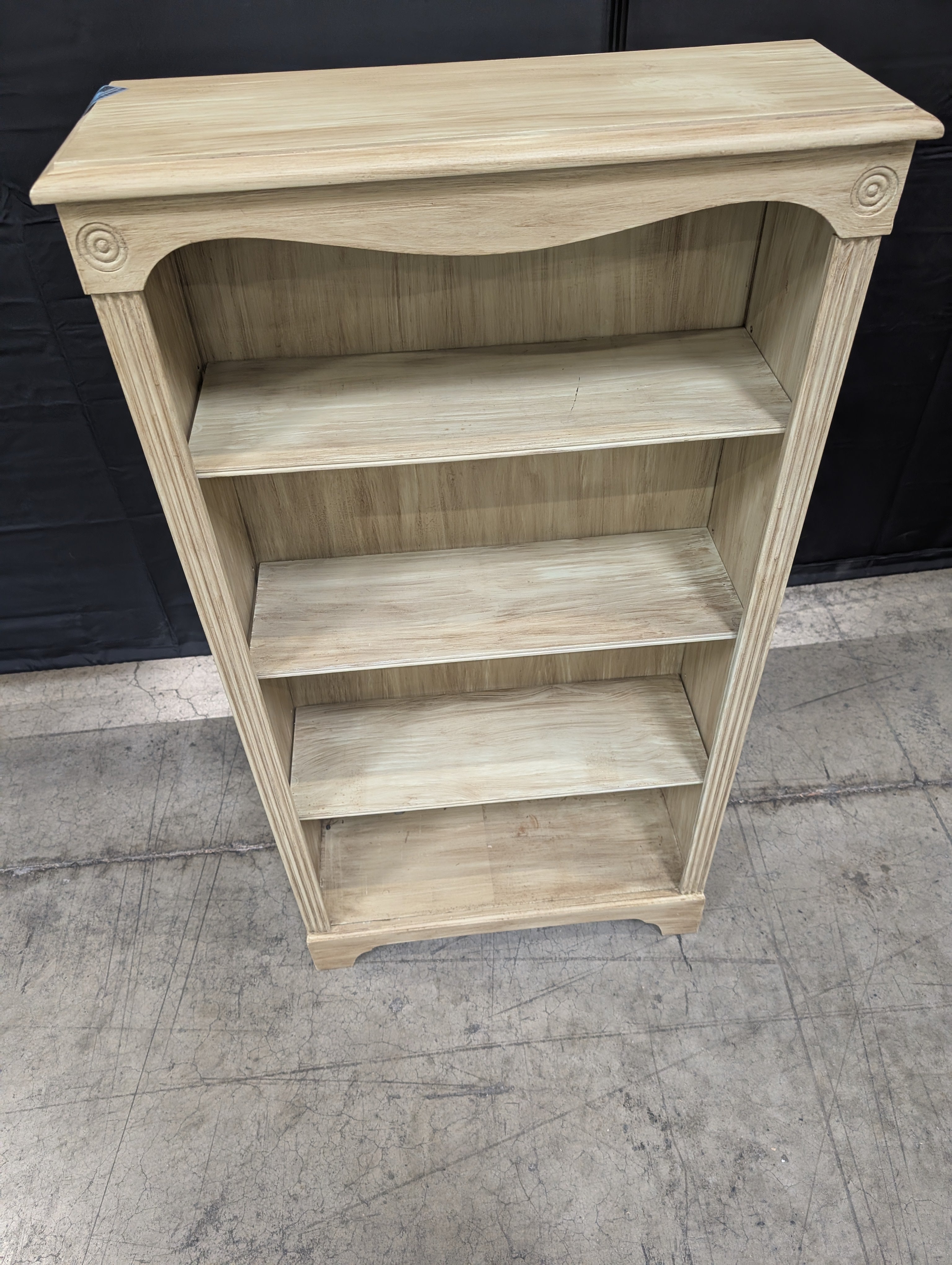 Light Wood Tone Four-Shelf Bookcase with Arched Detail