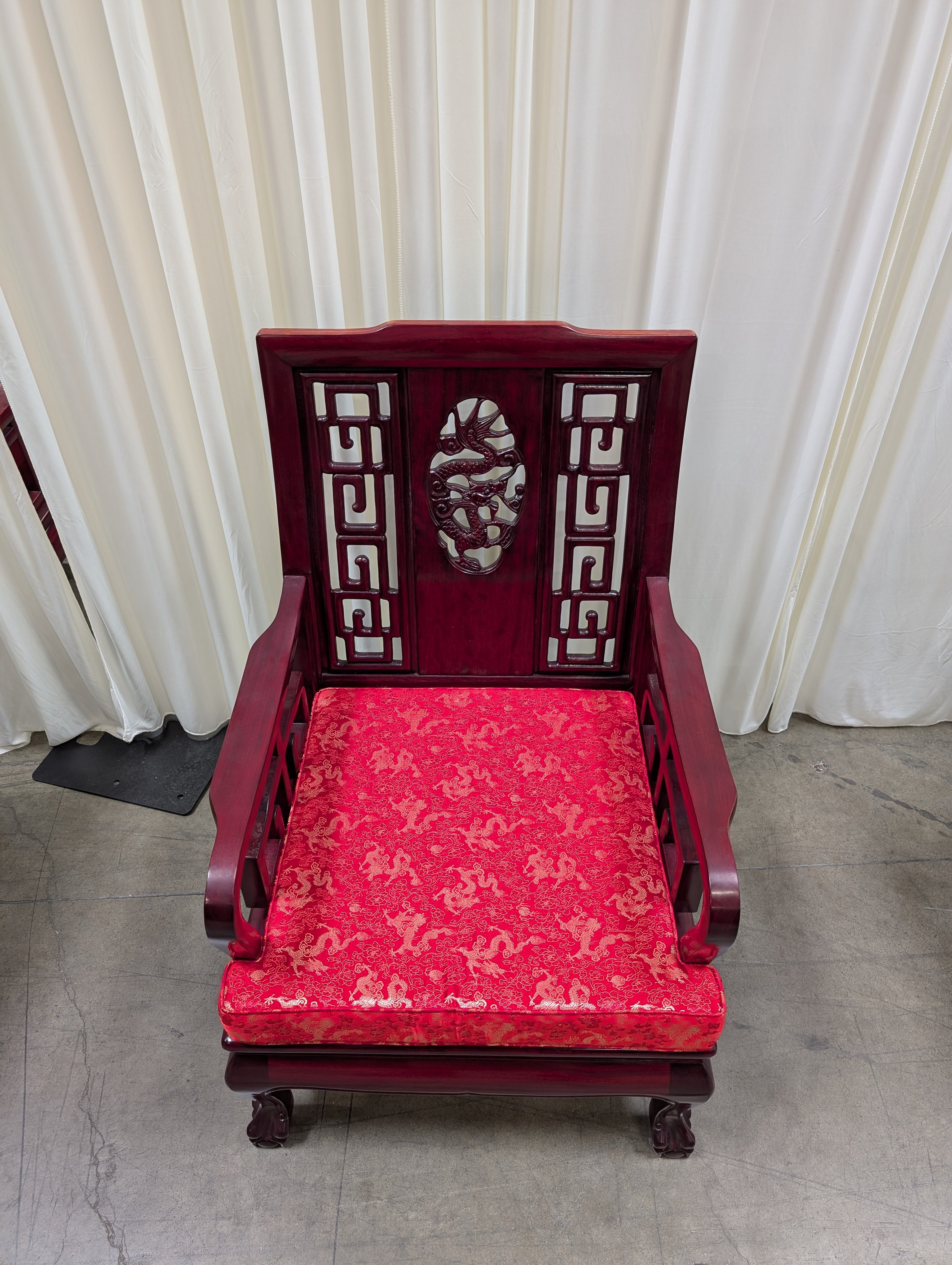 Dark Wood Carved Arm Chair with Red Cushion