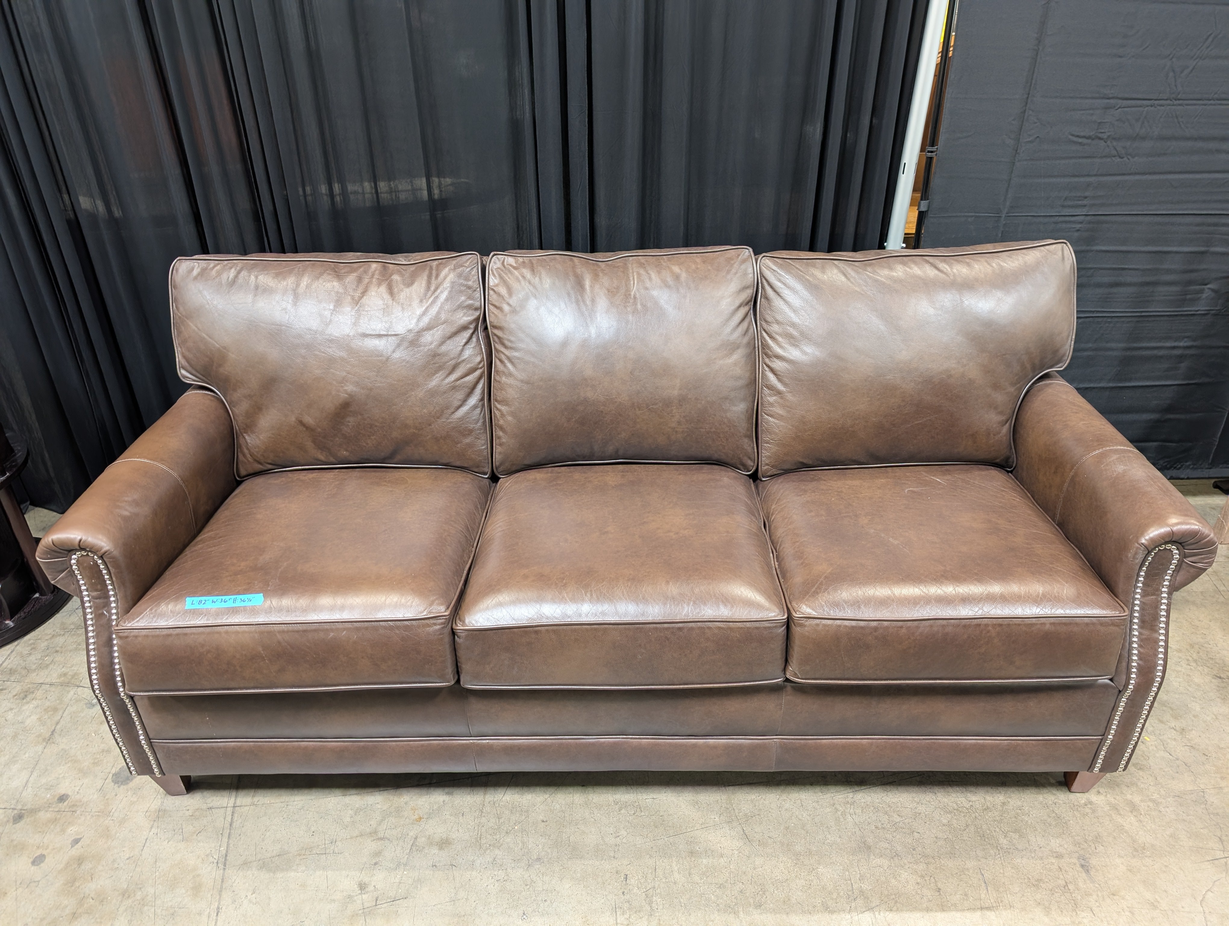 Brown Leather Three-Seat Couch with Nailhead Trim
