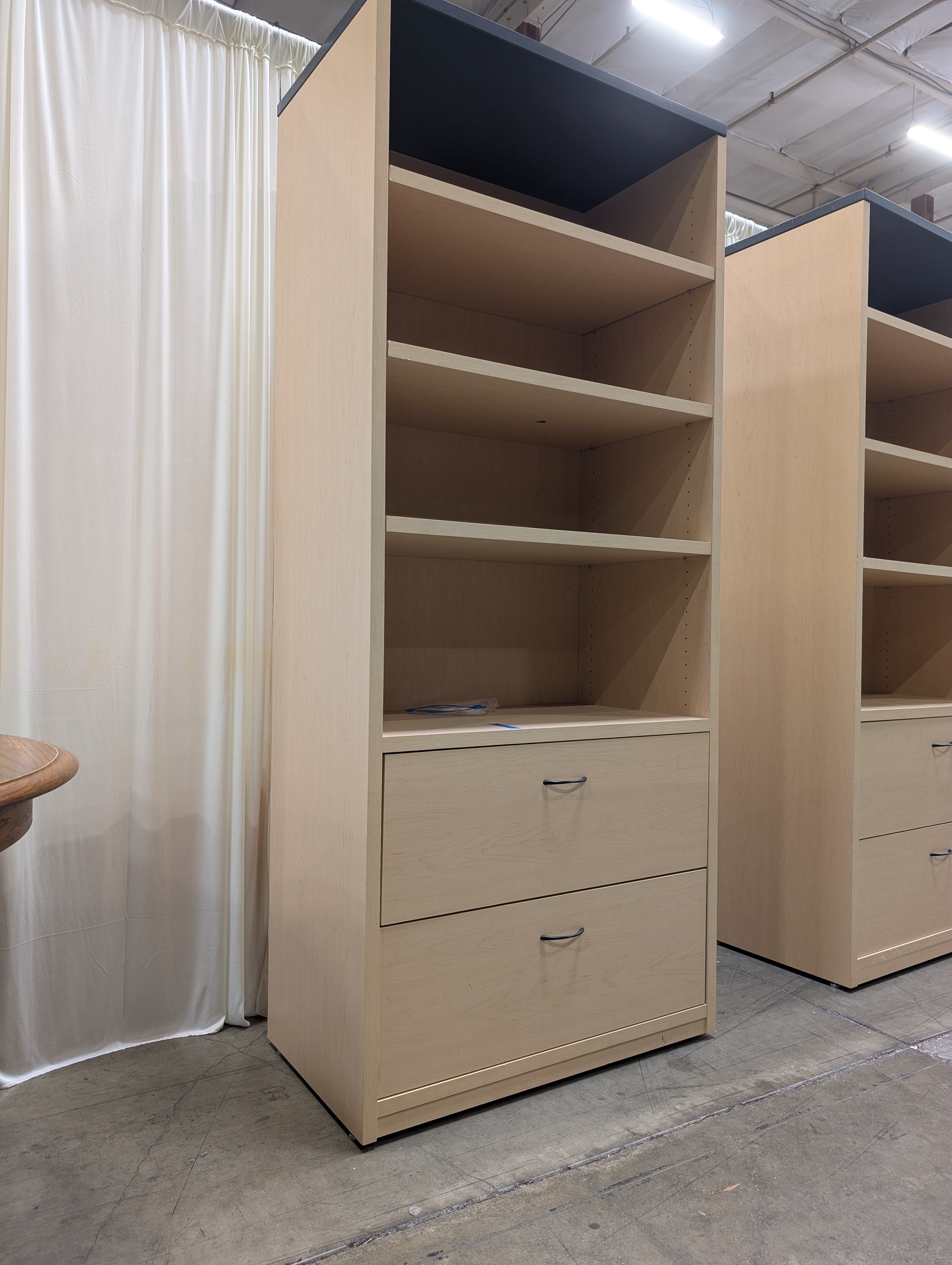 Light Wood Three-Shelf Bookcase with Two Drawers