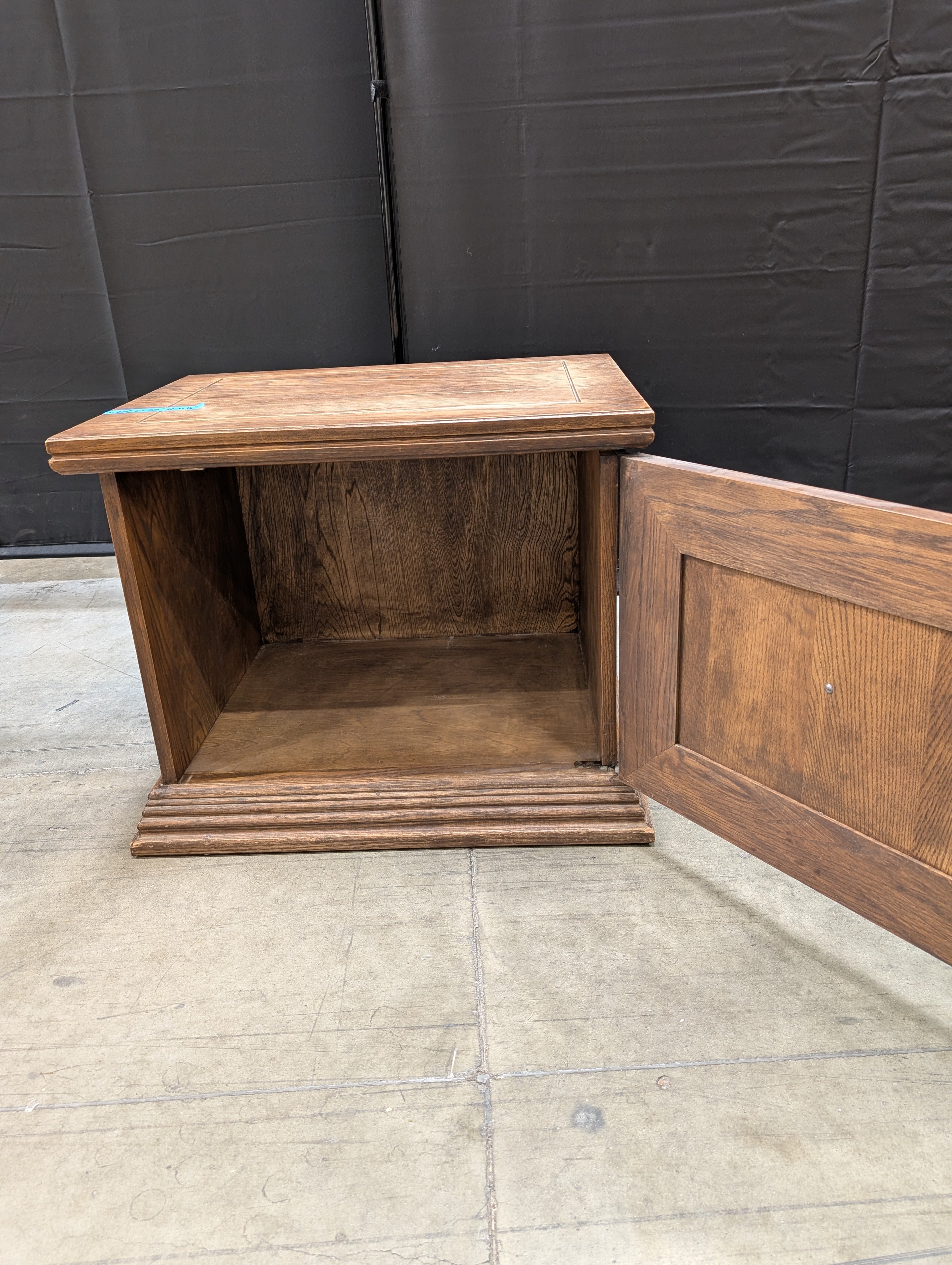 Traditional Hardwood Nightstand with Ornate Medallion Pull