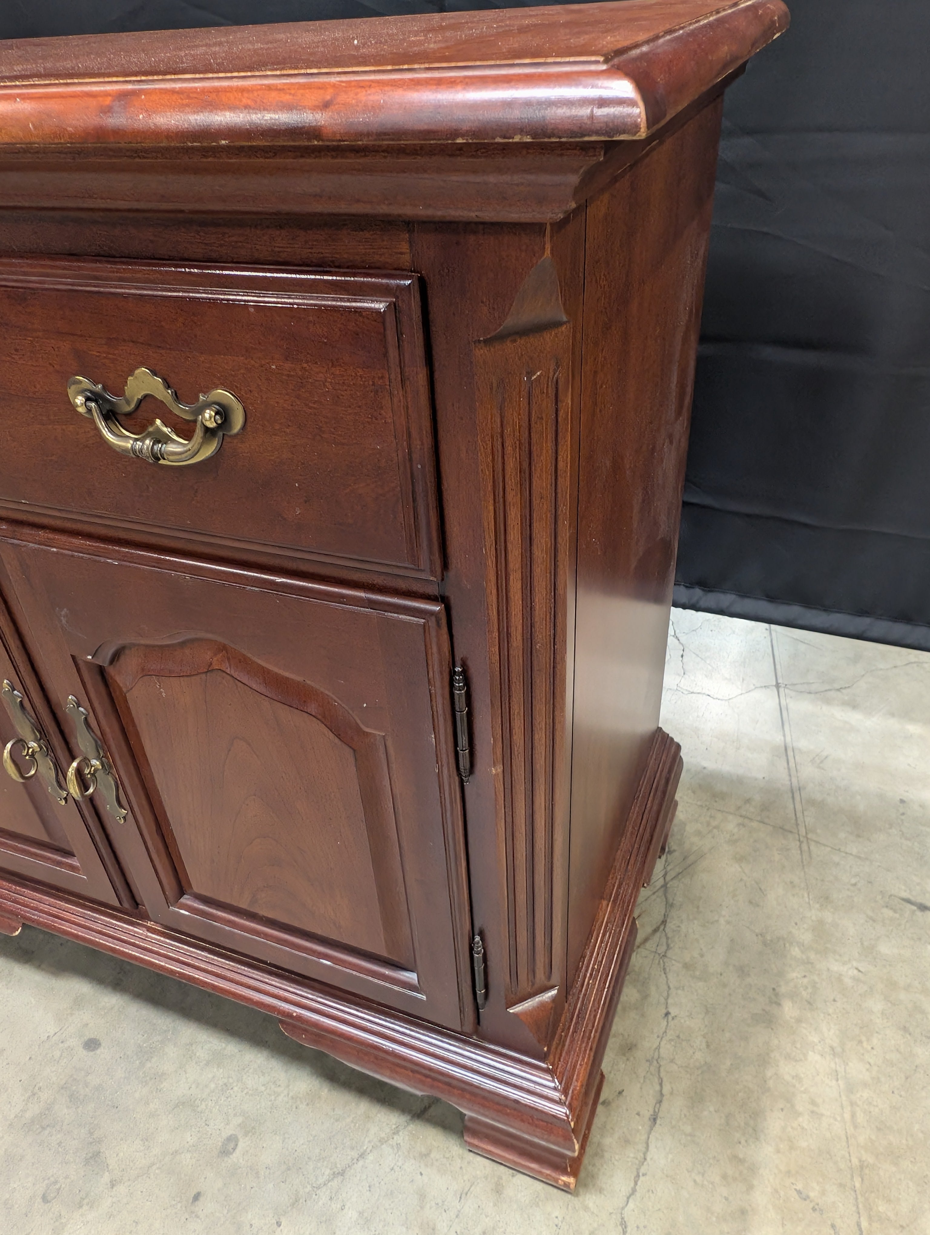 Traditional Reddish Brown Wood Accent Cabinet with Ornate Hardware