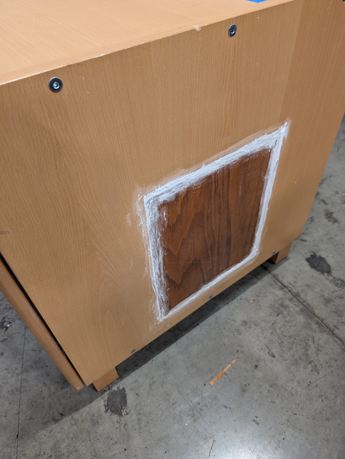 Light Wood Storage Cabinet with Frosted Panel Doors and Open Cubby