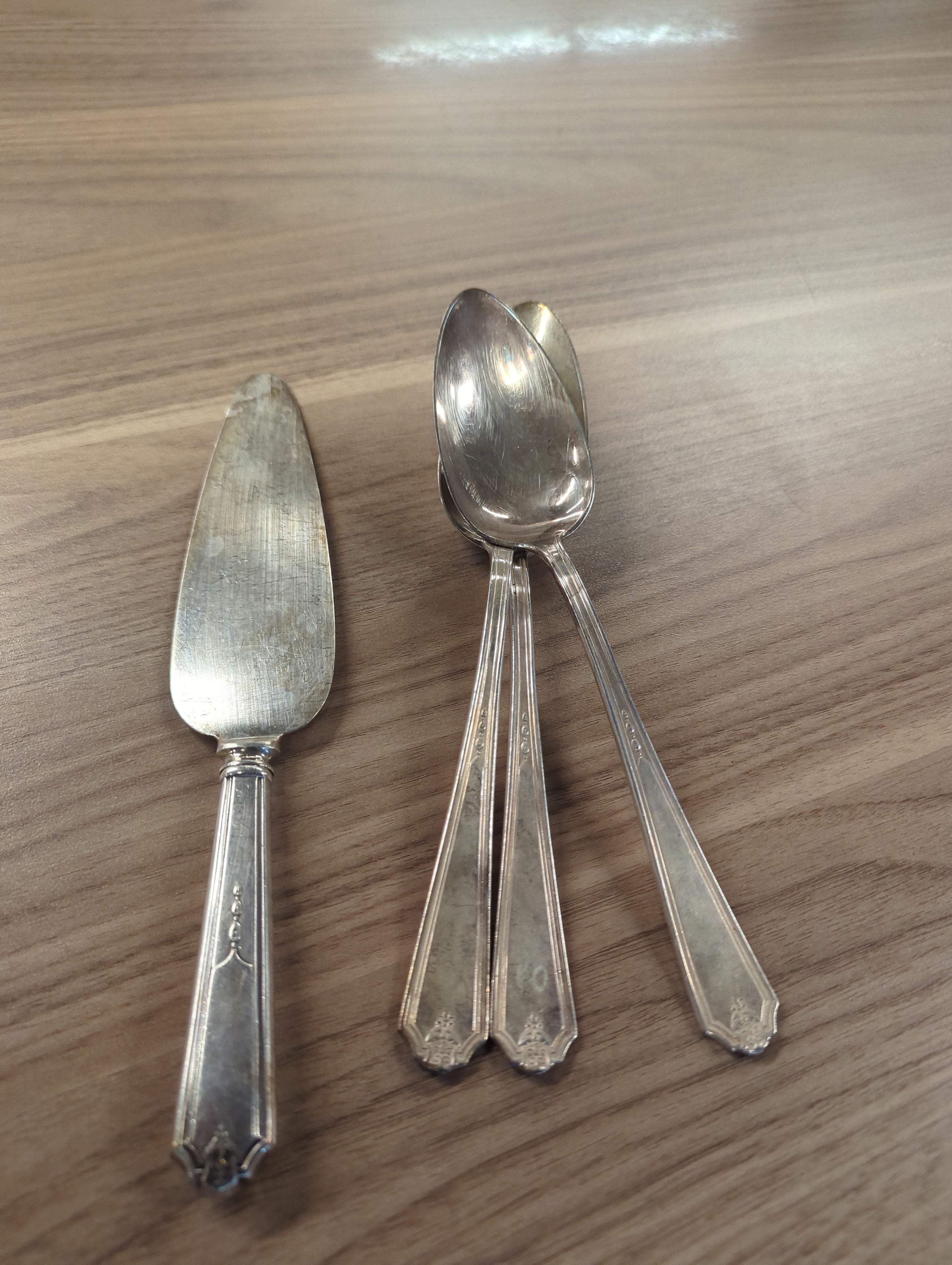 Serving knife and 3 serving spoons