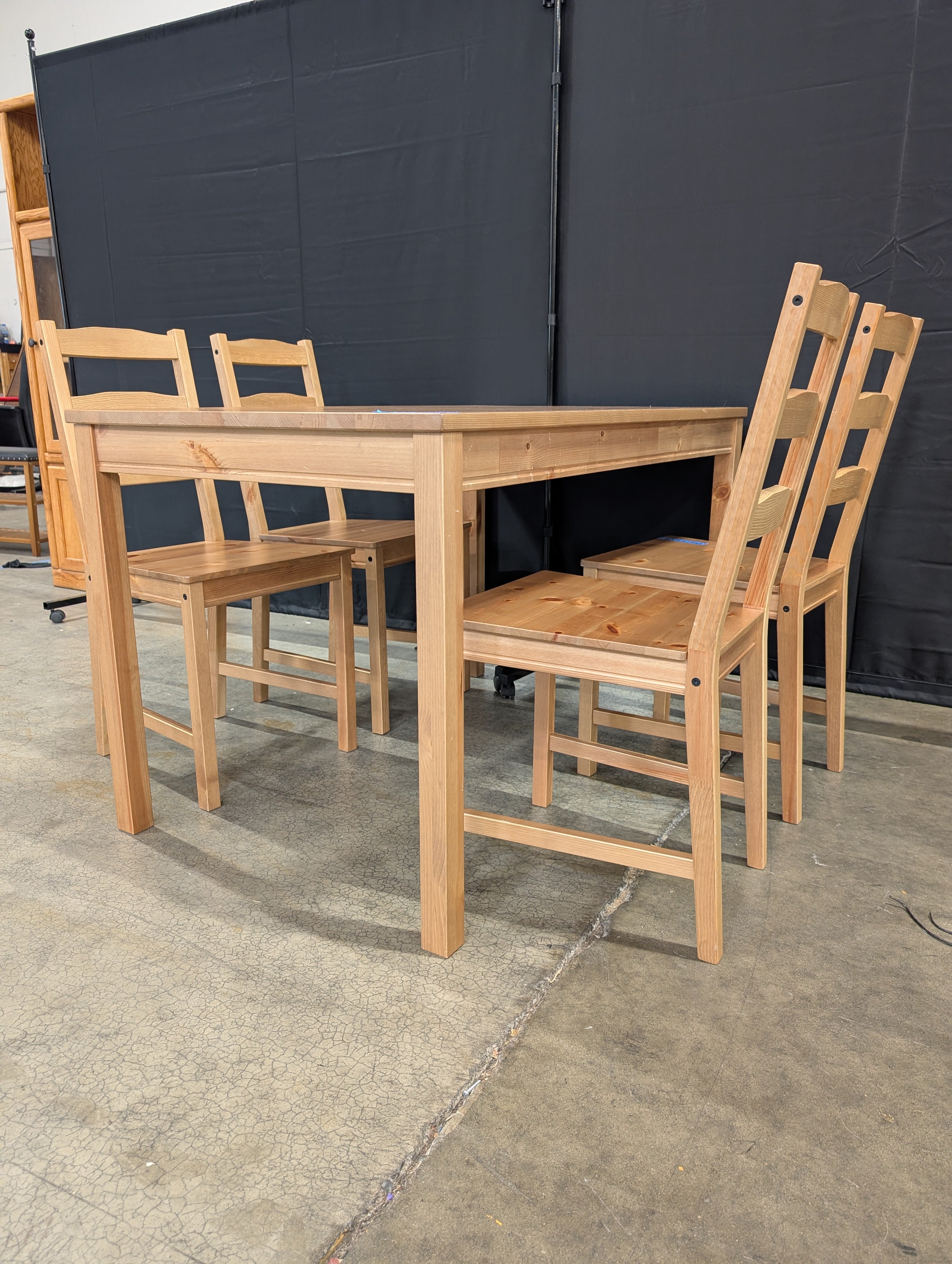 Natural Wood Plank Dining Table with Four Ladder Back Chairs