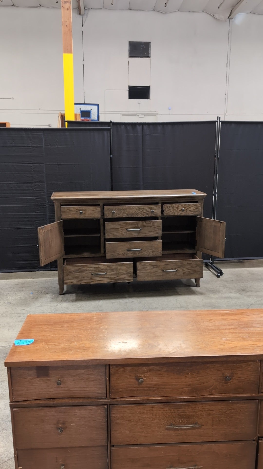 Spacious Dark Wood Magnussen Home Dresser with Varied Storage