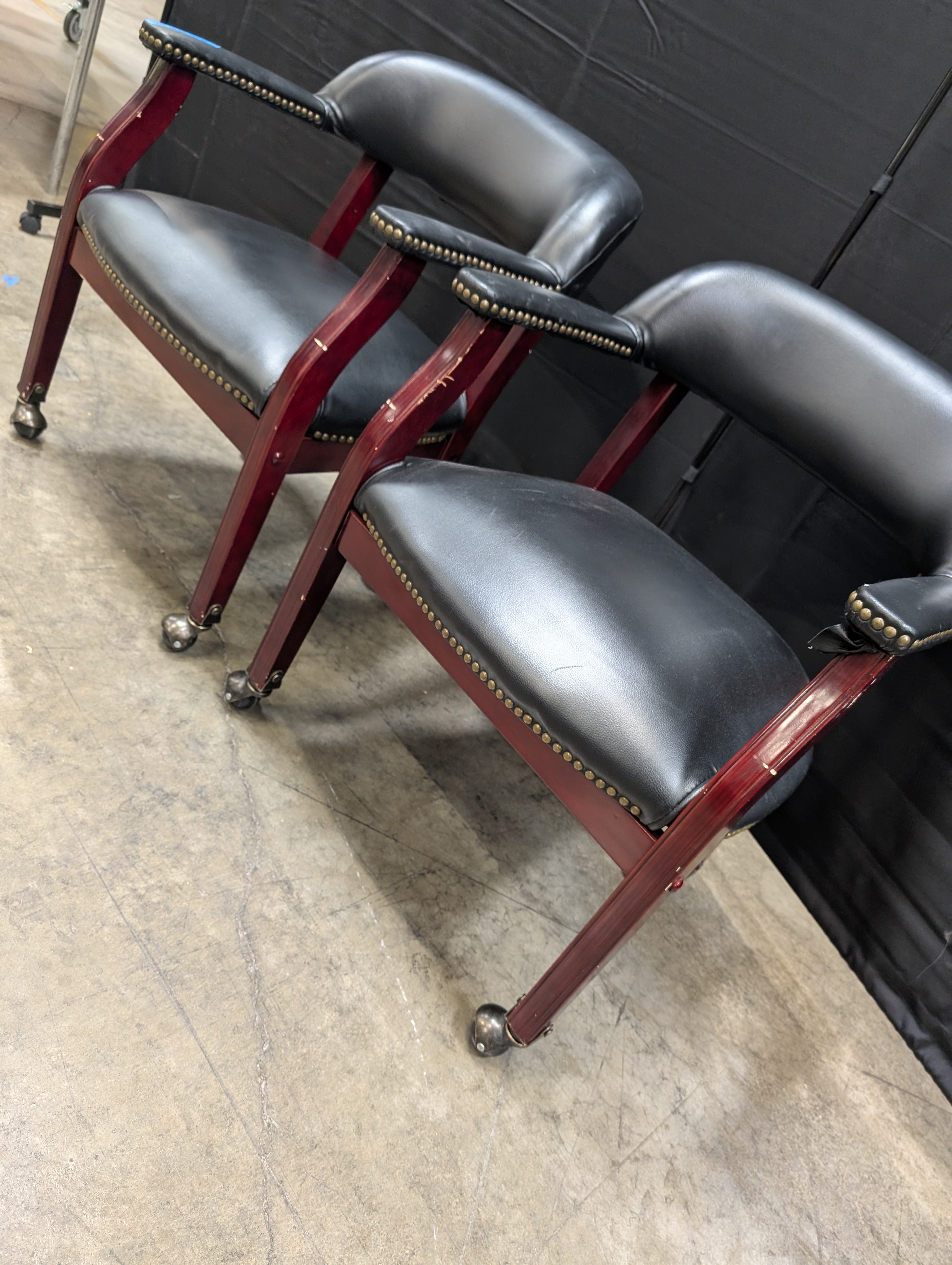 Pair of Traditional Black Upholstered Armchairs with Dark Wood Frames
