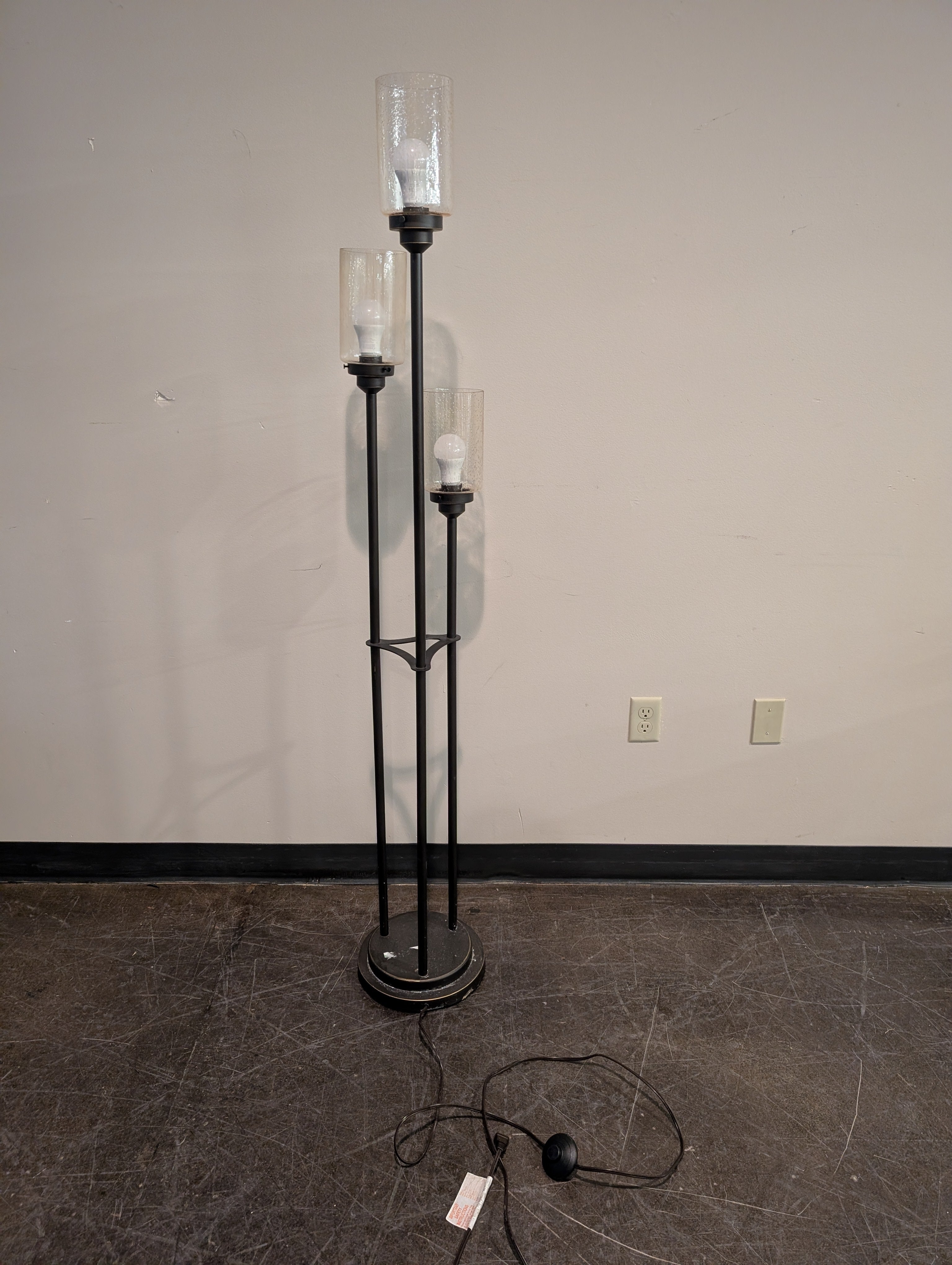 Contemporary Black Metal Three-Light Floor Lamp with Textured Glass Shades