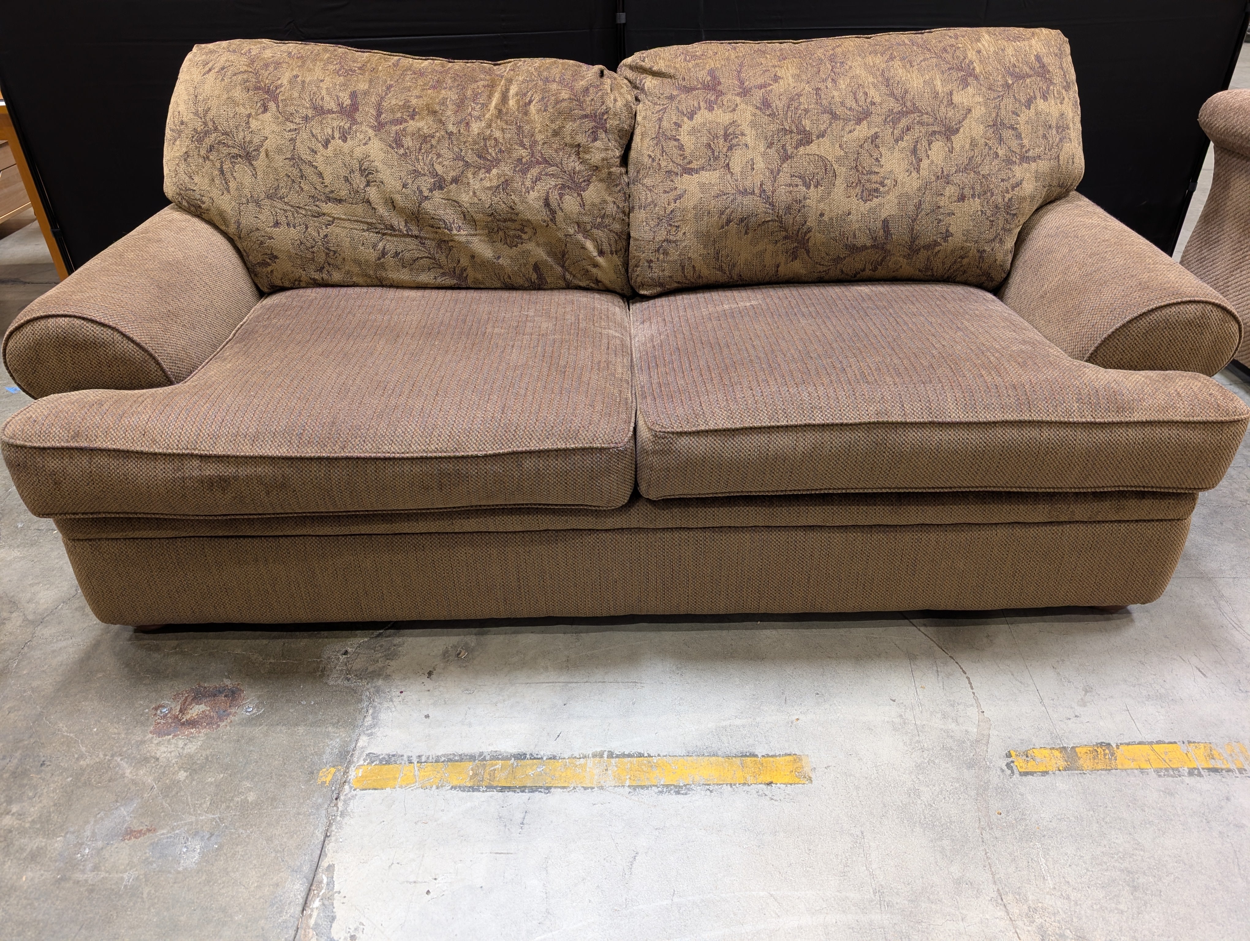 Sklar Peppler Spacious Earth-Toned Sectional Sofa with Patterned Cushions