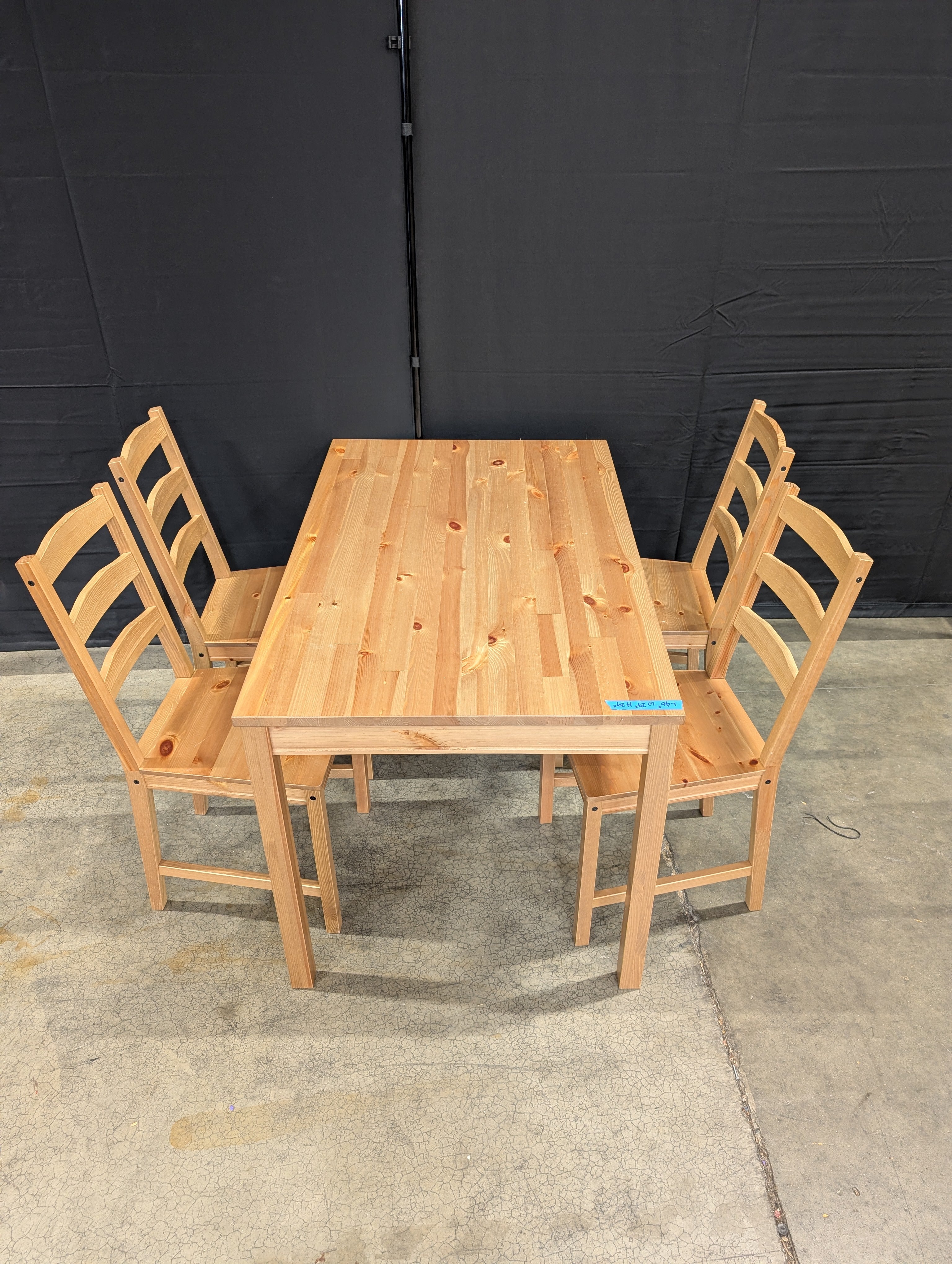 Natural Wood Plank Dining Table with Four Ladder Back Chairs