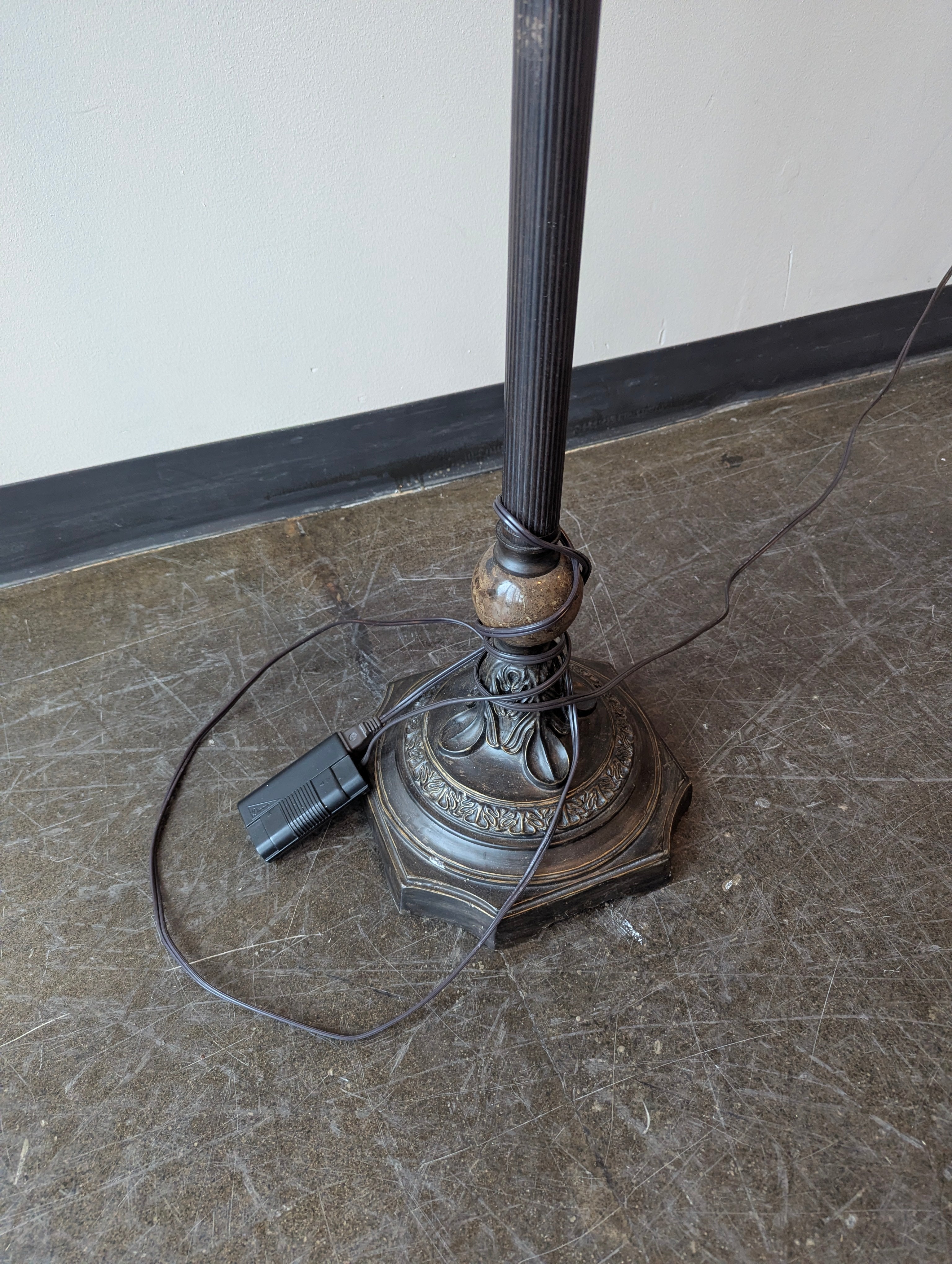 Ornate Dark Metal Torchiere Floor Lamp with Amber Mottled Shade