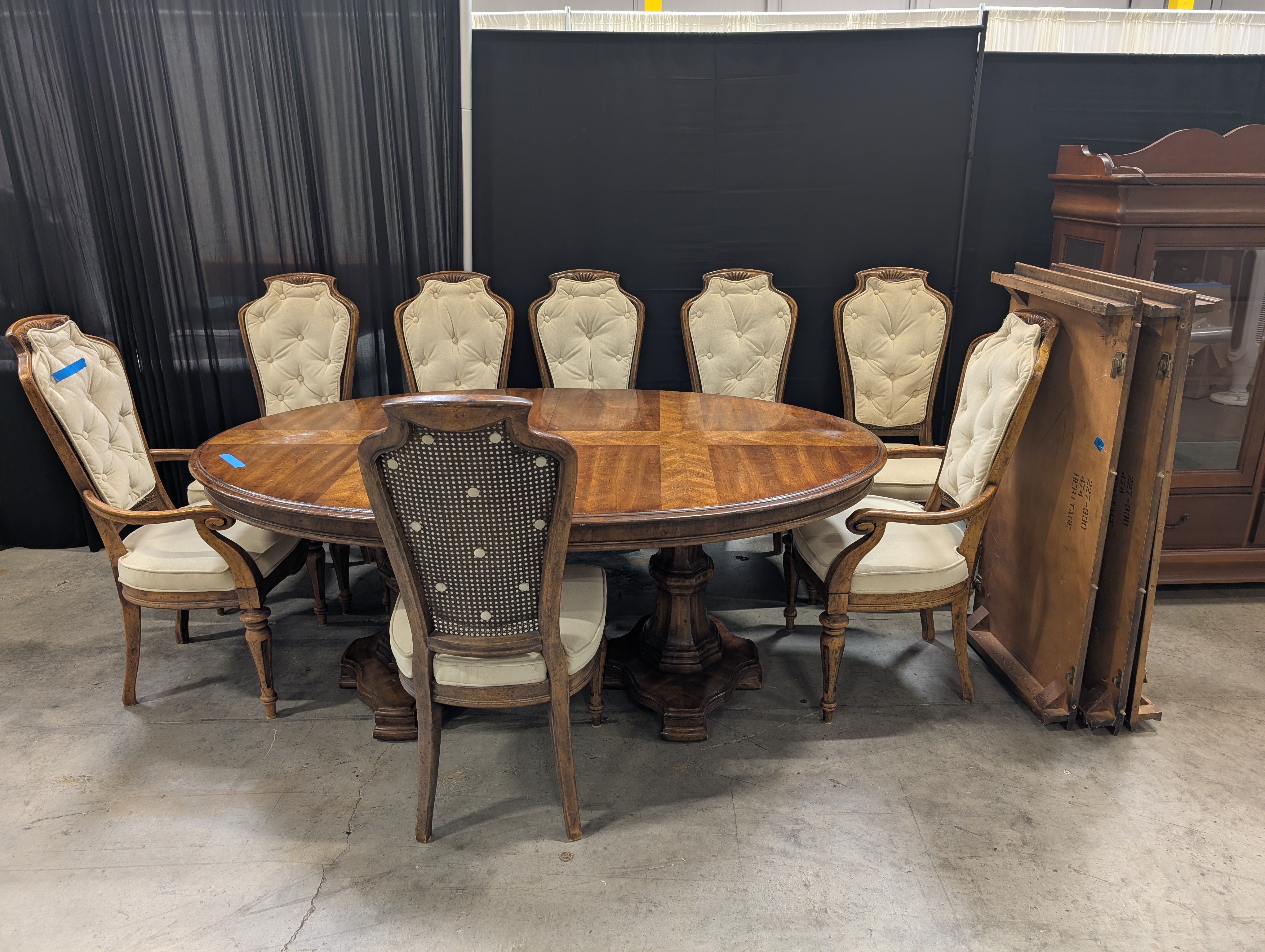 Traditional Carved Wood Dining Table with Eight Upholstered Chairs and Three Leafs