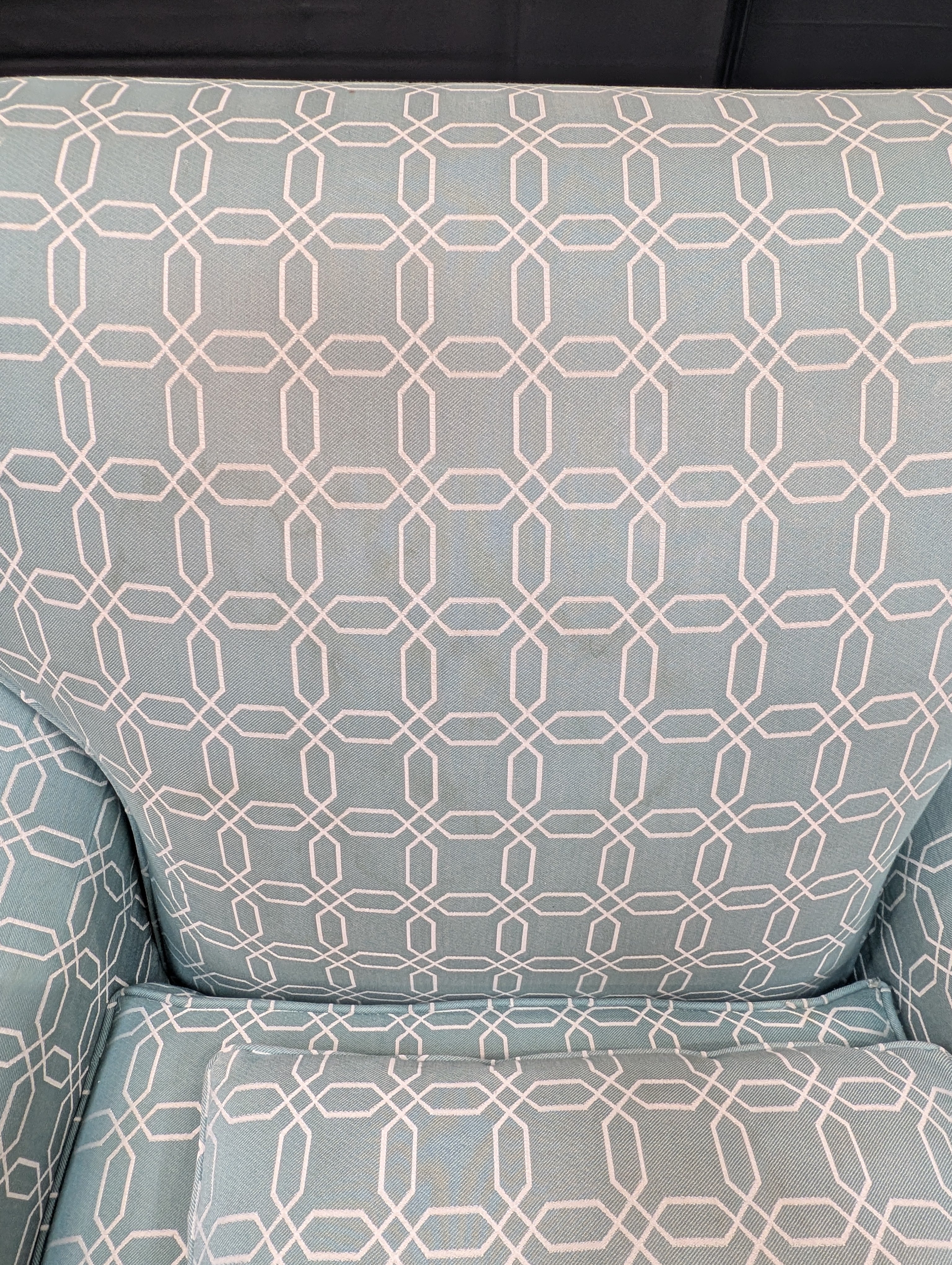 Comfortable Armchair with Green Wavy Pattern Slipcover