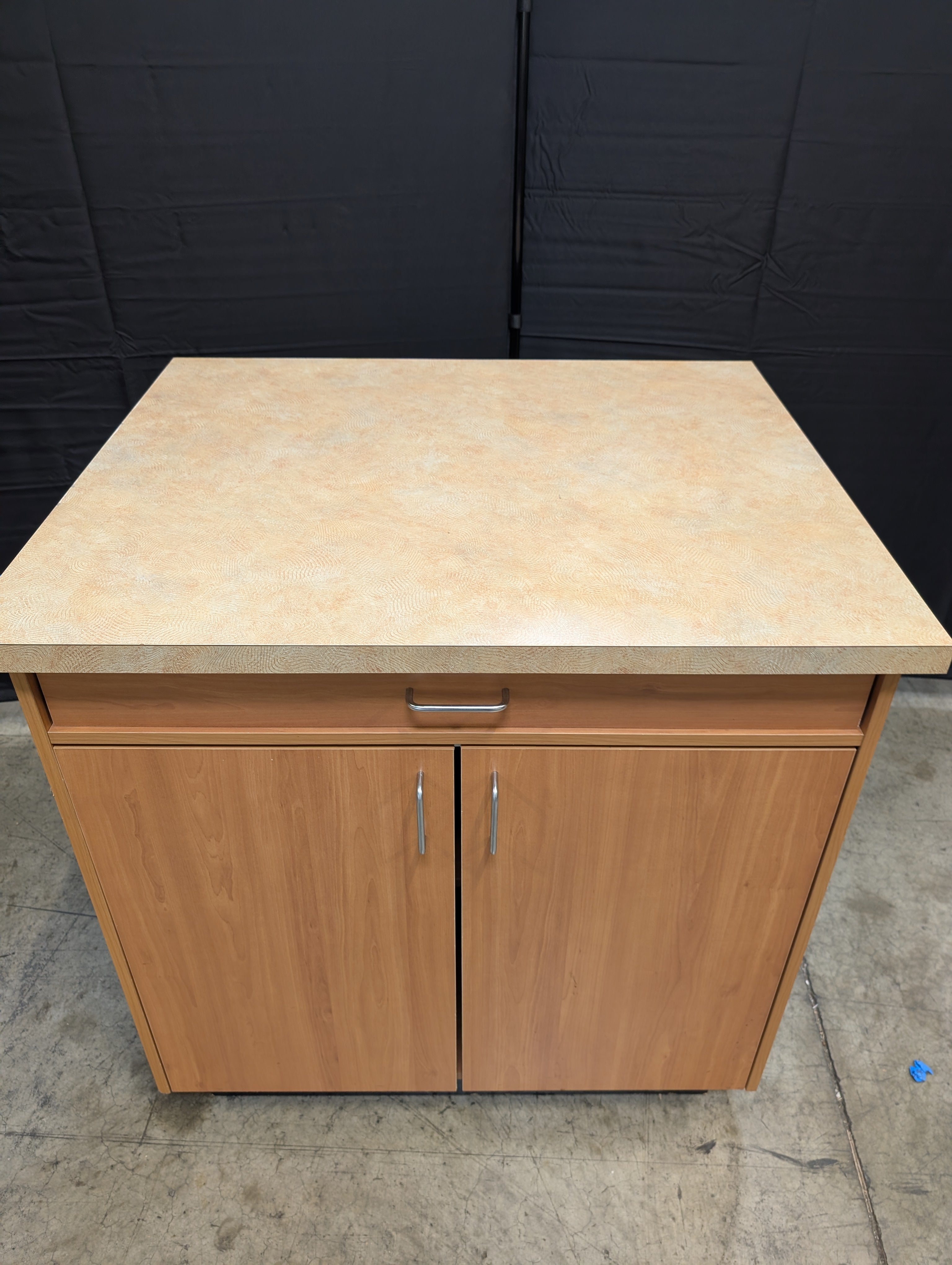 Two-Door Base Cabinet with Speckled Laminate Countertop