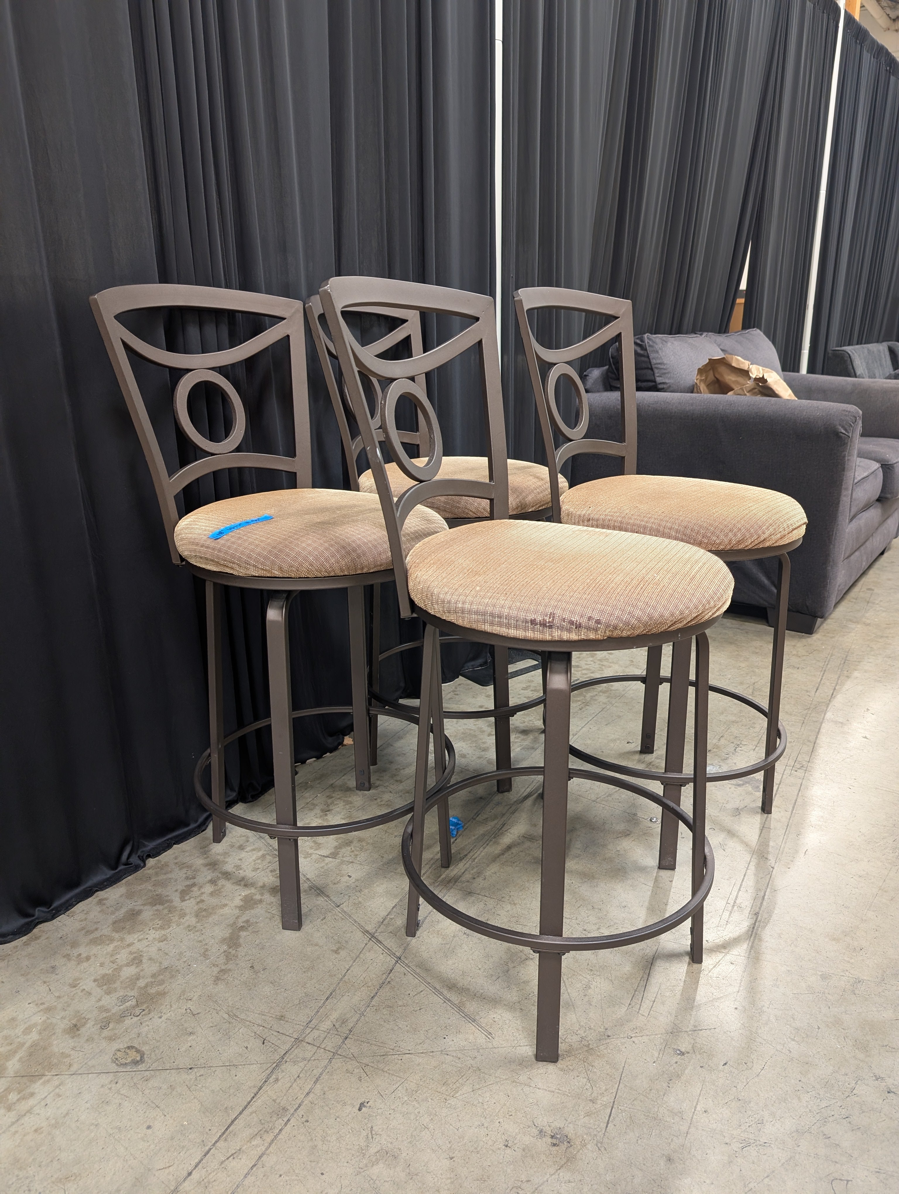 Set of Four Tan Upholstered Swivel Bar Stool in Dark Metal