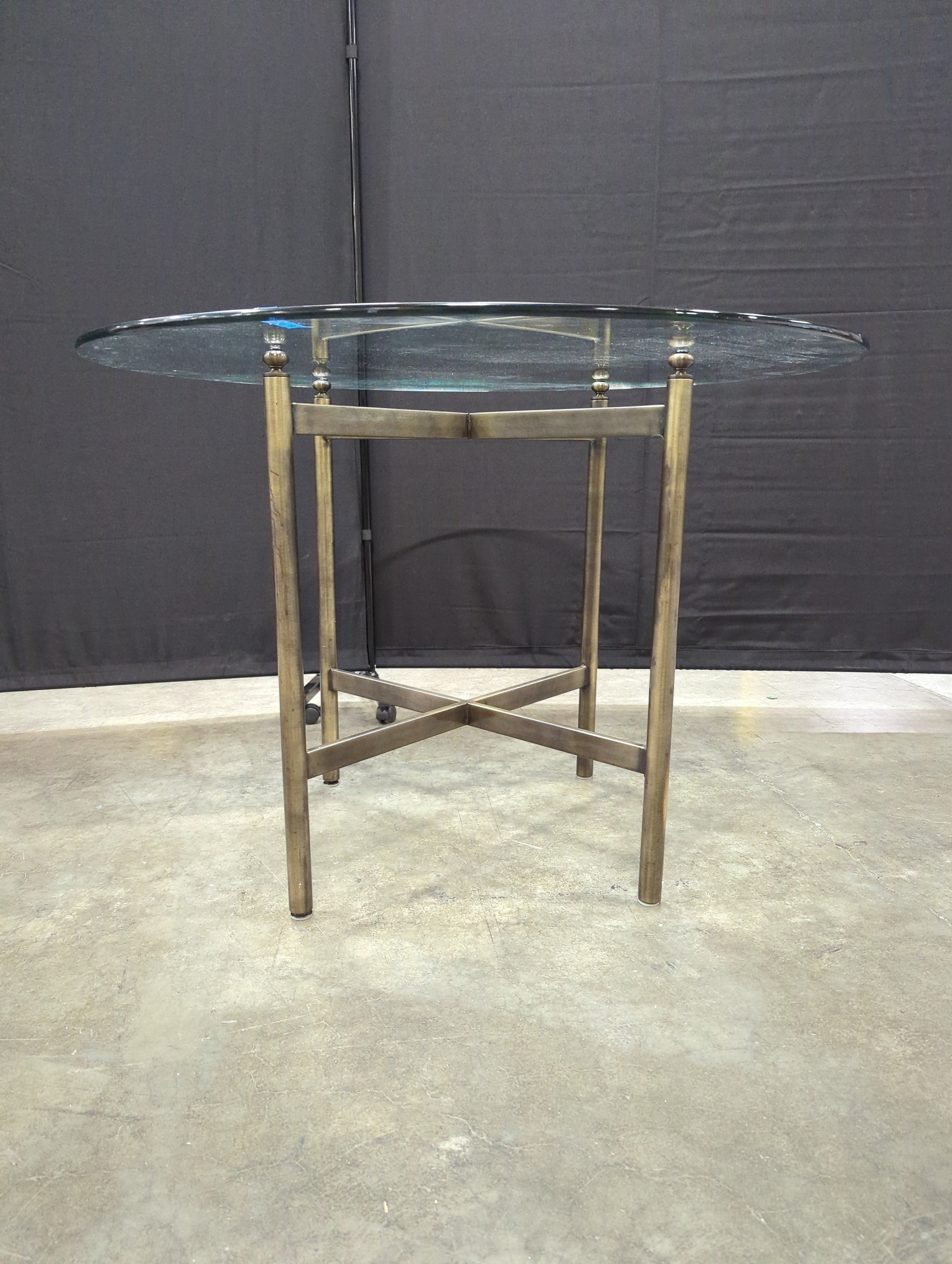 Circular Glass Top Dining Table with Brass-Tone Metal Base