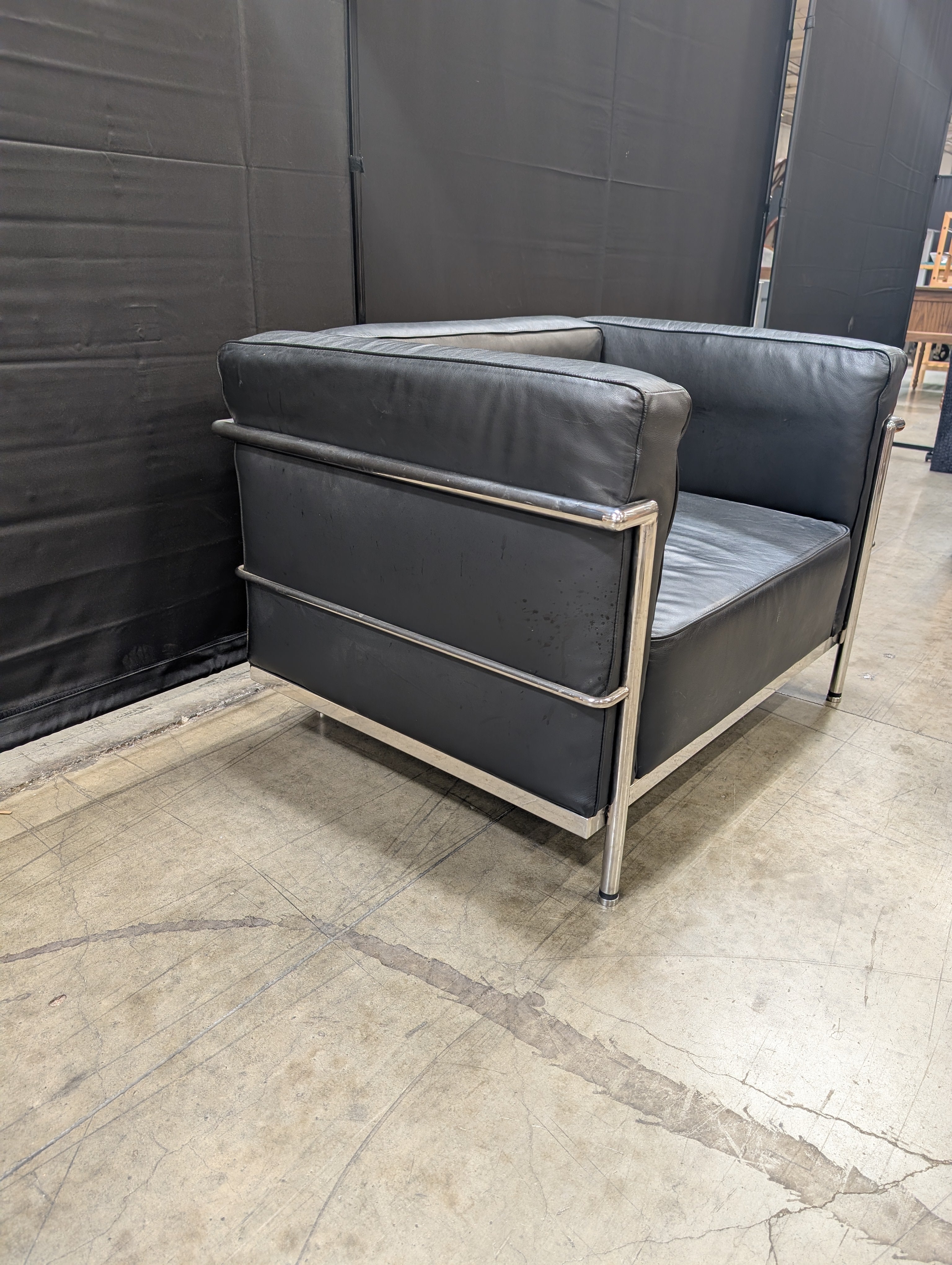Modern Black Armchair with Polished Metal Frame