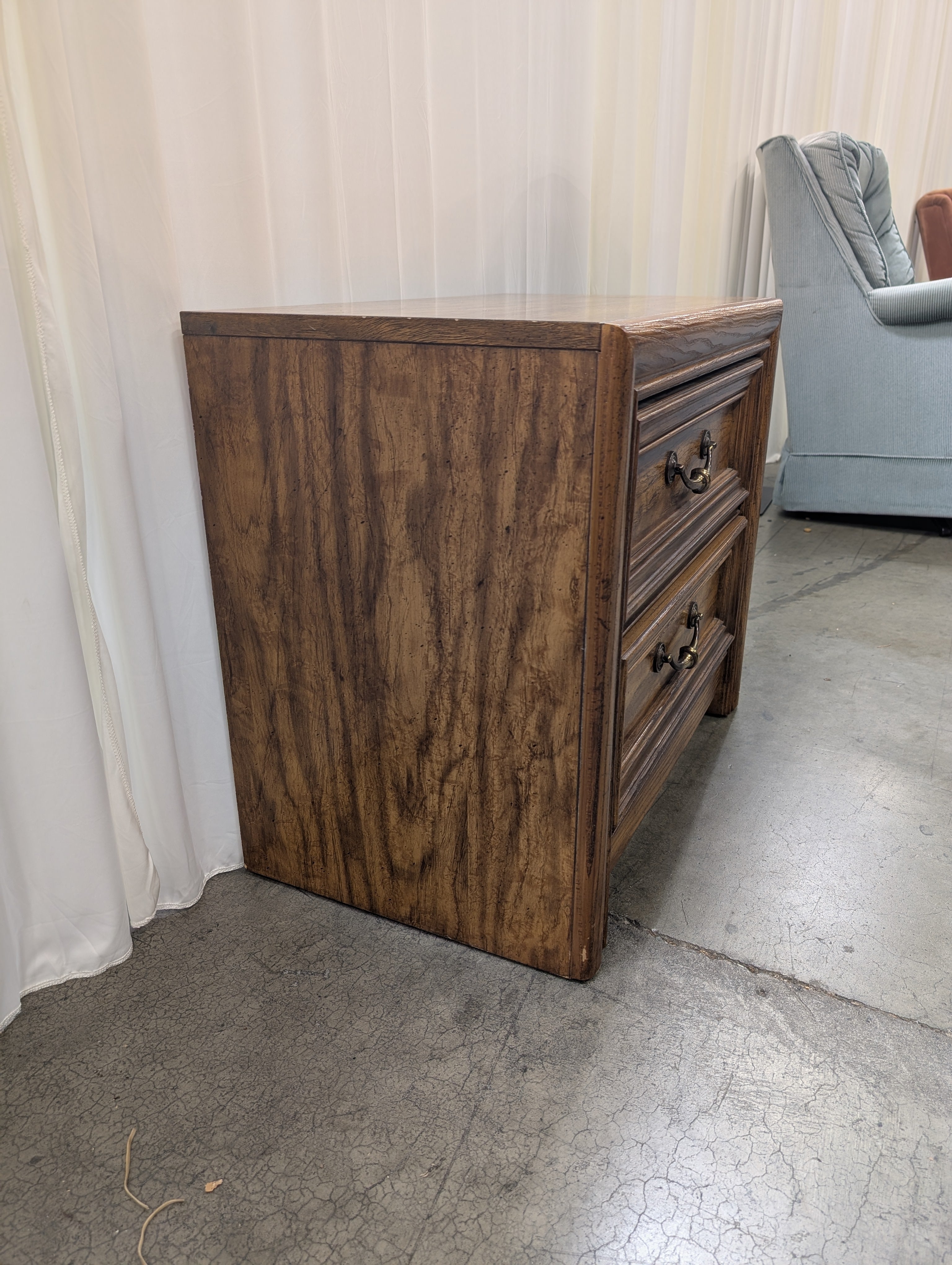 Warm Brown Wood Two-Drawer Nightstand with Ornate Hardware