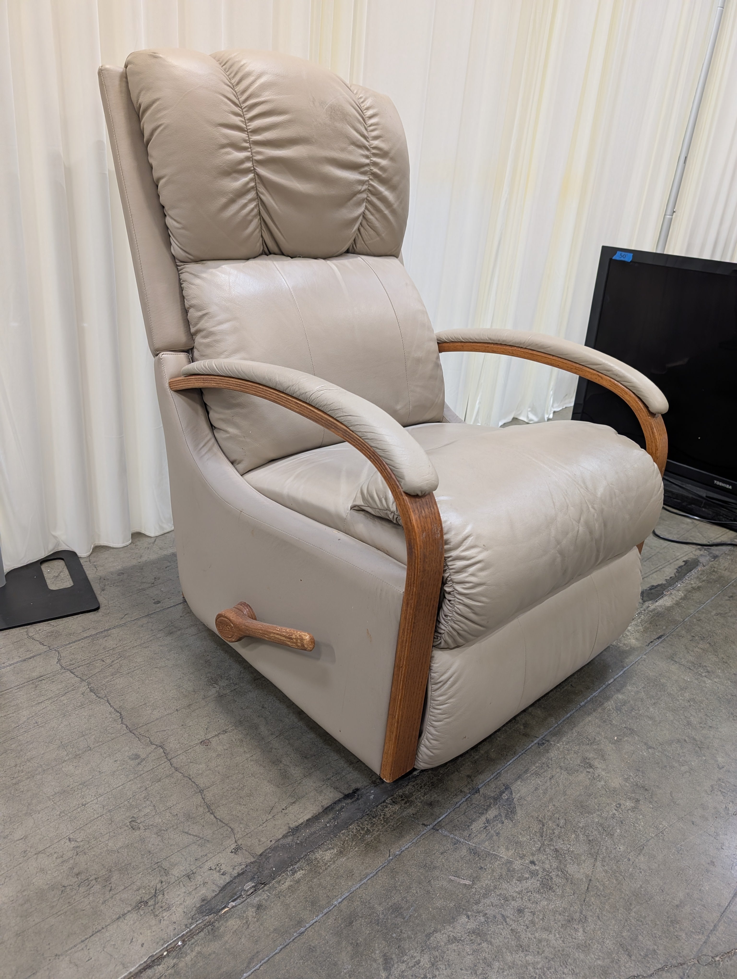 Grey Leatherette Recliner with Wood Trim