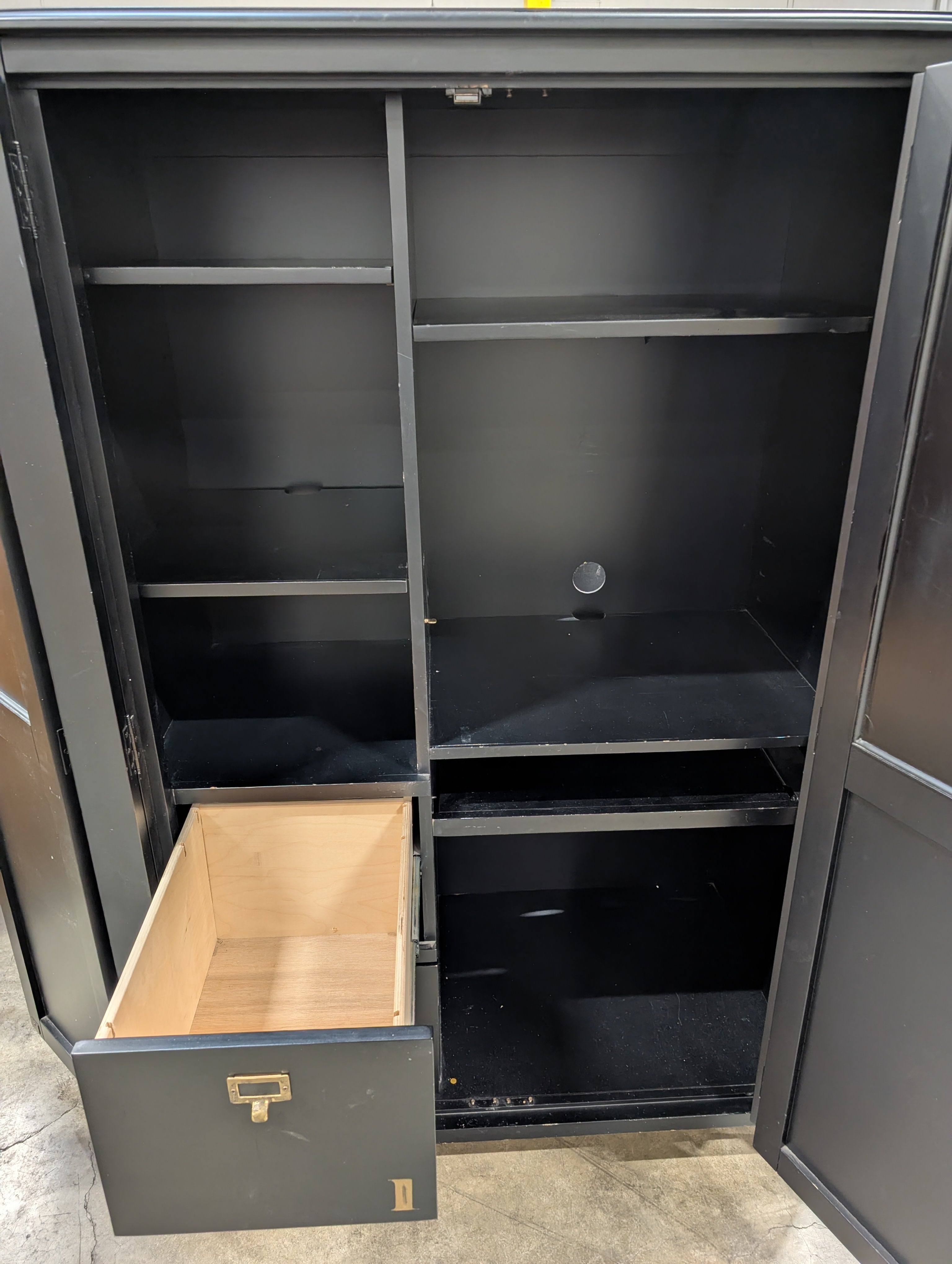 Versatile Black Wood Storage Armoire with Paneled Doors