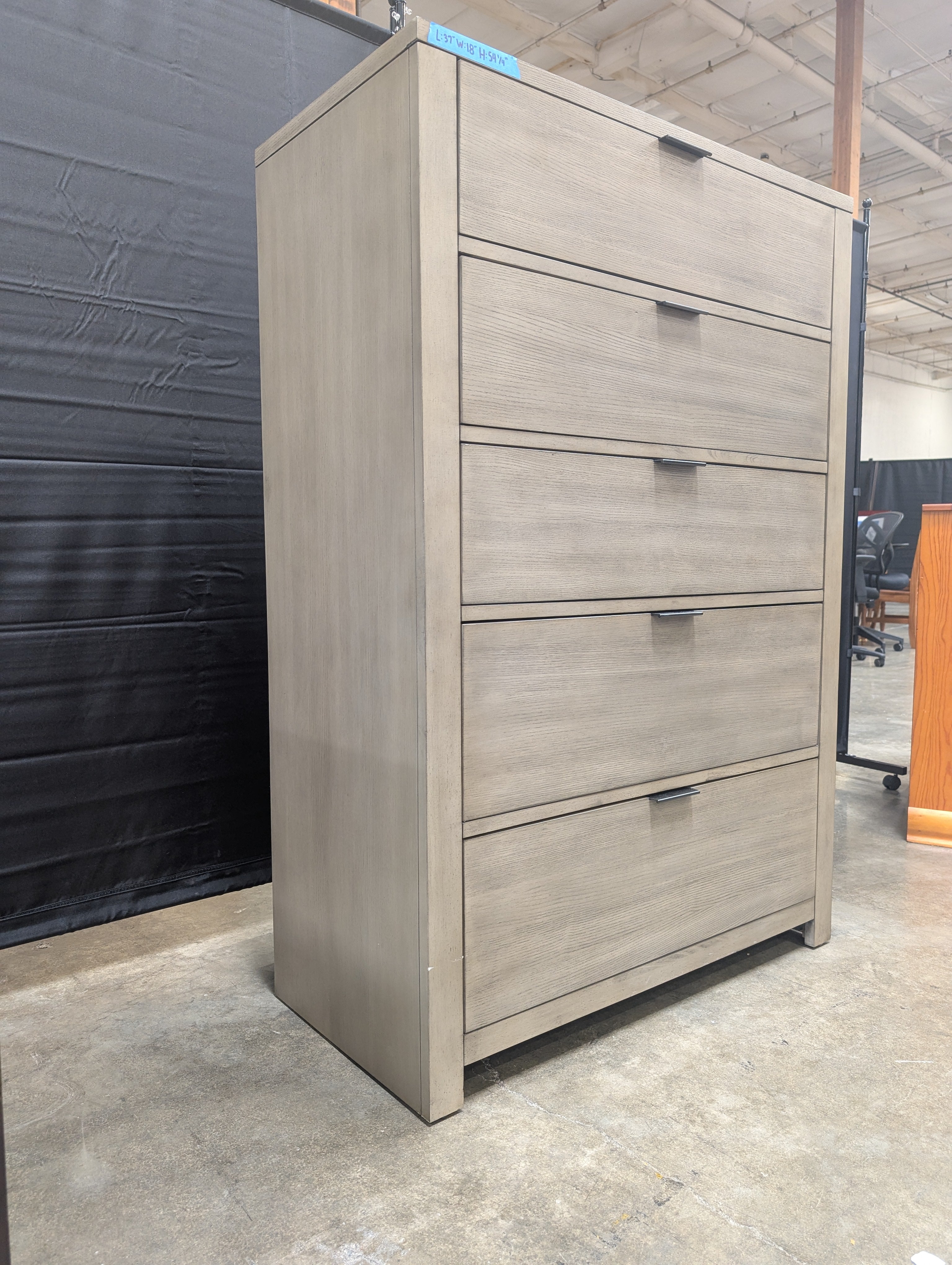 Grey Wood Five-Drawer Dresser with Metal Pulls