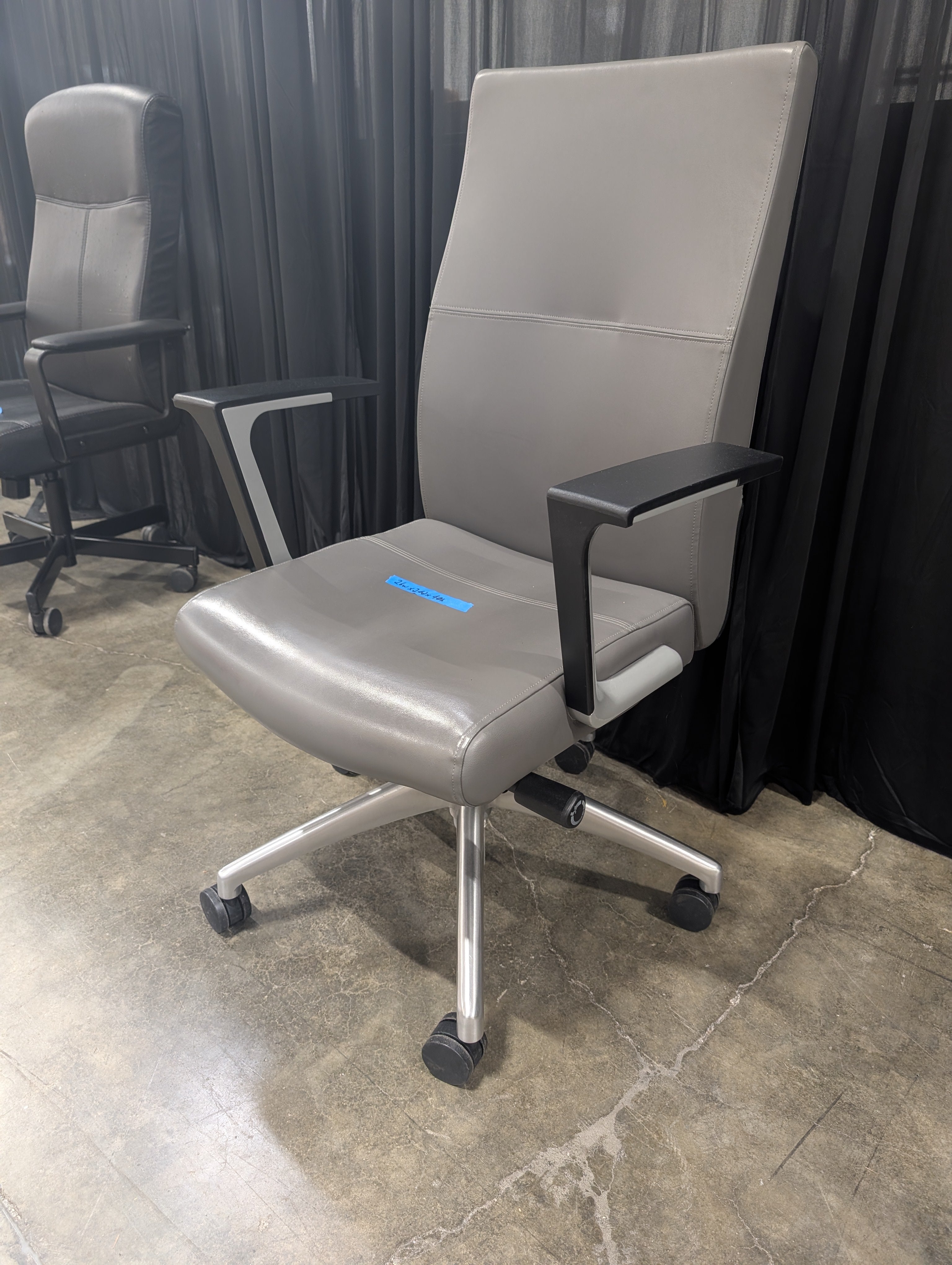 Grey Padded Leather Swivel Office Chair with Caster Wheels