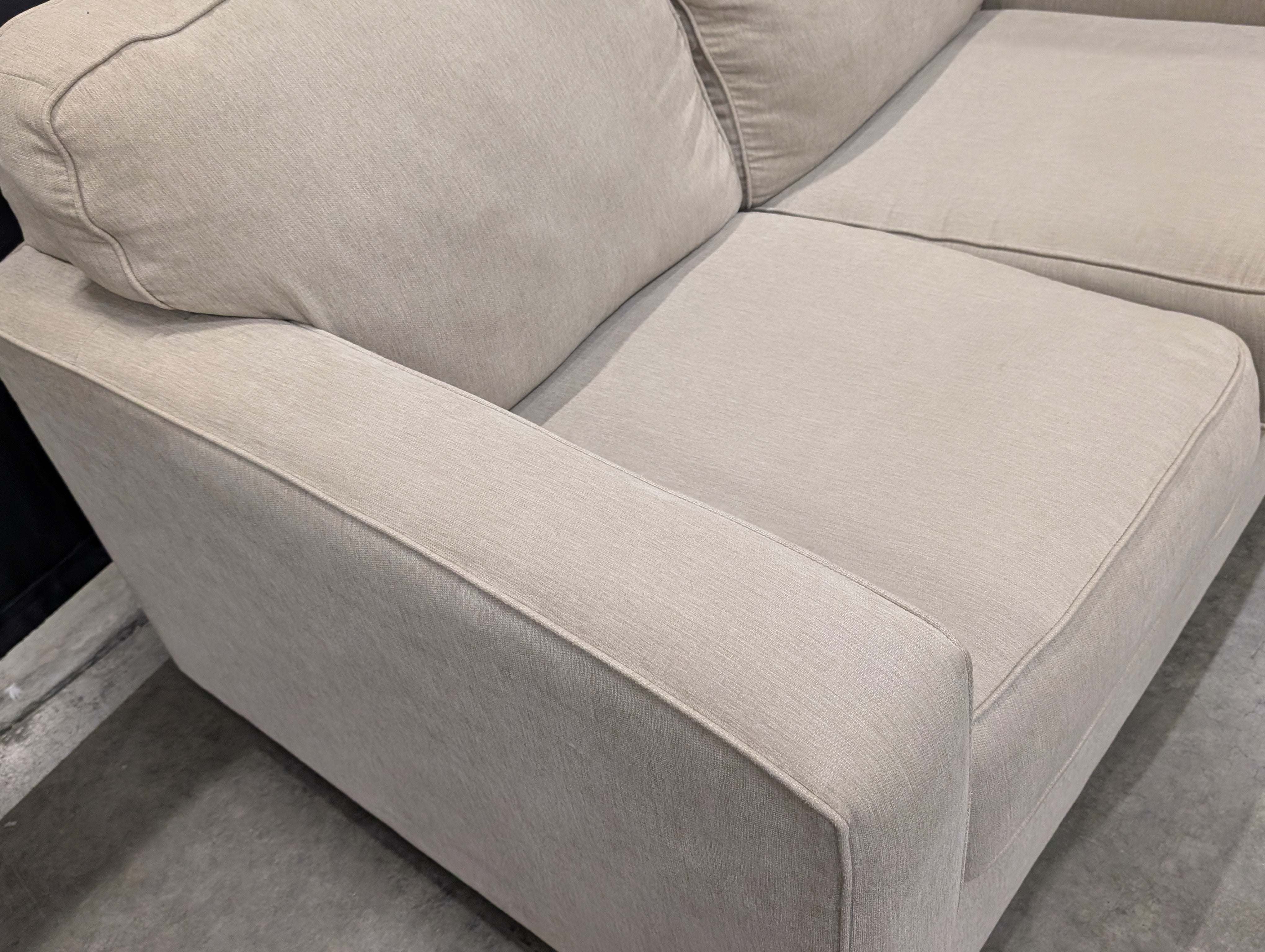 Ashley Furniture Neutral Fabric Two-Seater Sofa