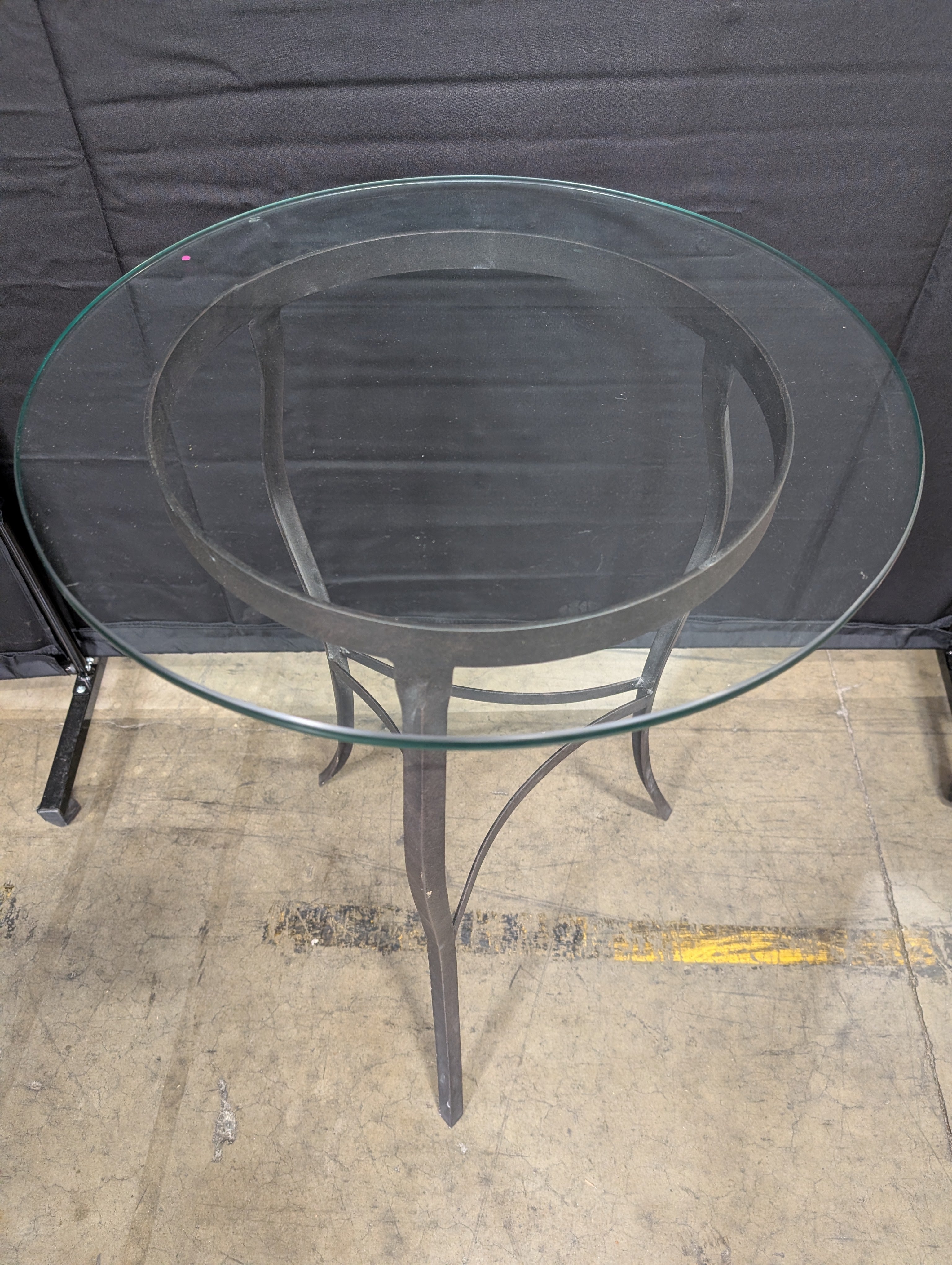 Round Glass Top Bistro Table with Dark Metal Base