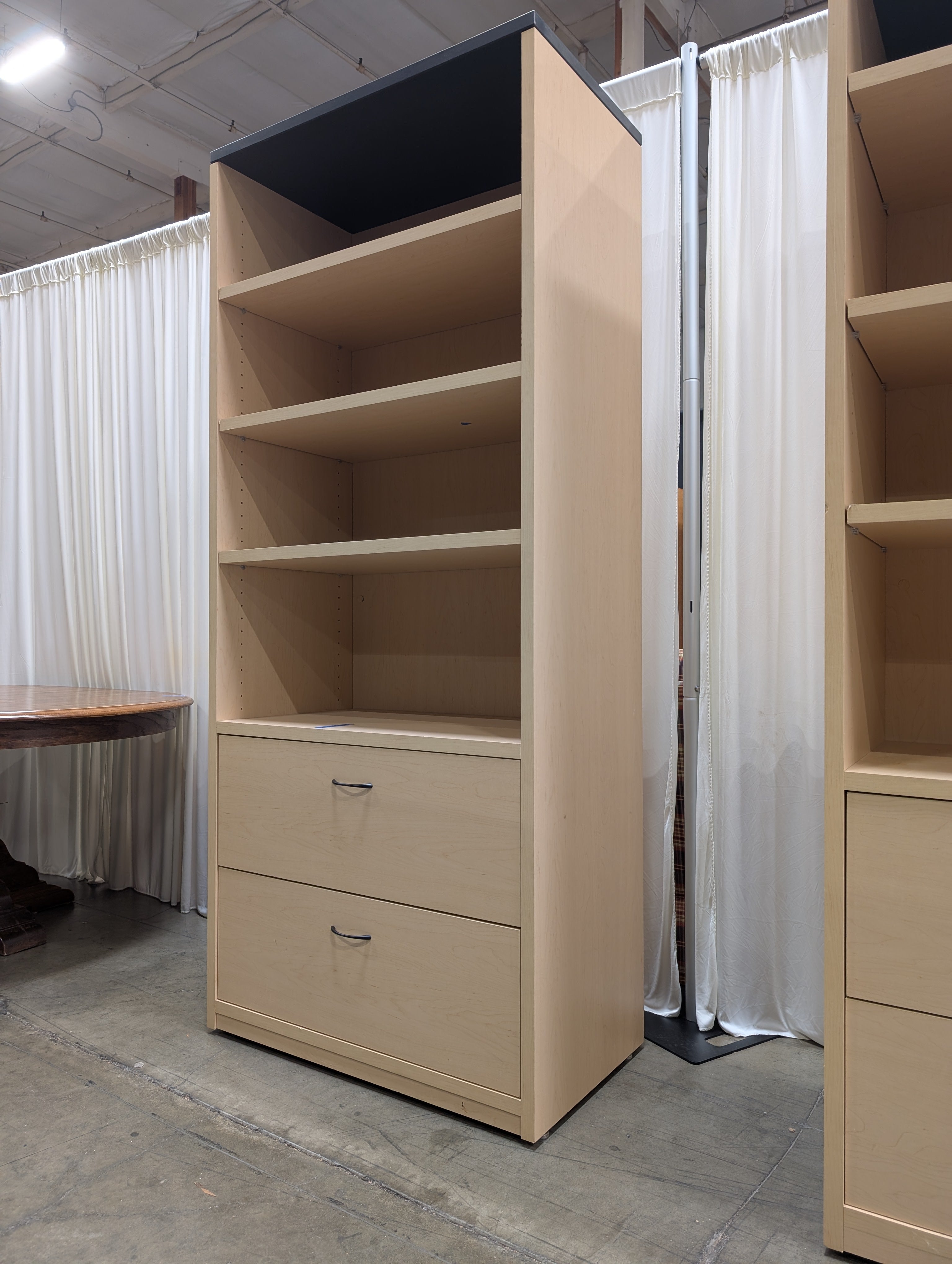 Light Wood Three-Shelf Bookcase with Two Drawers