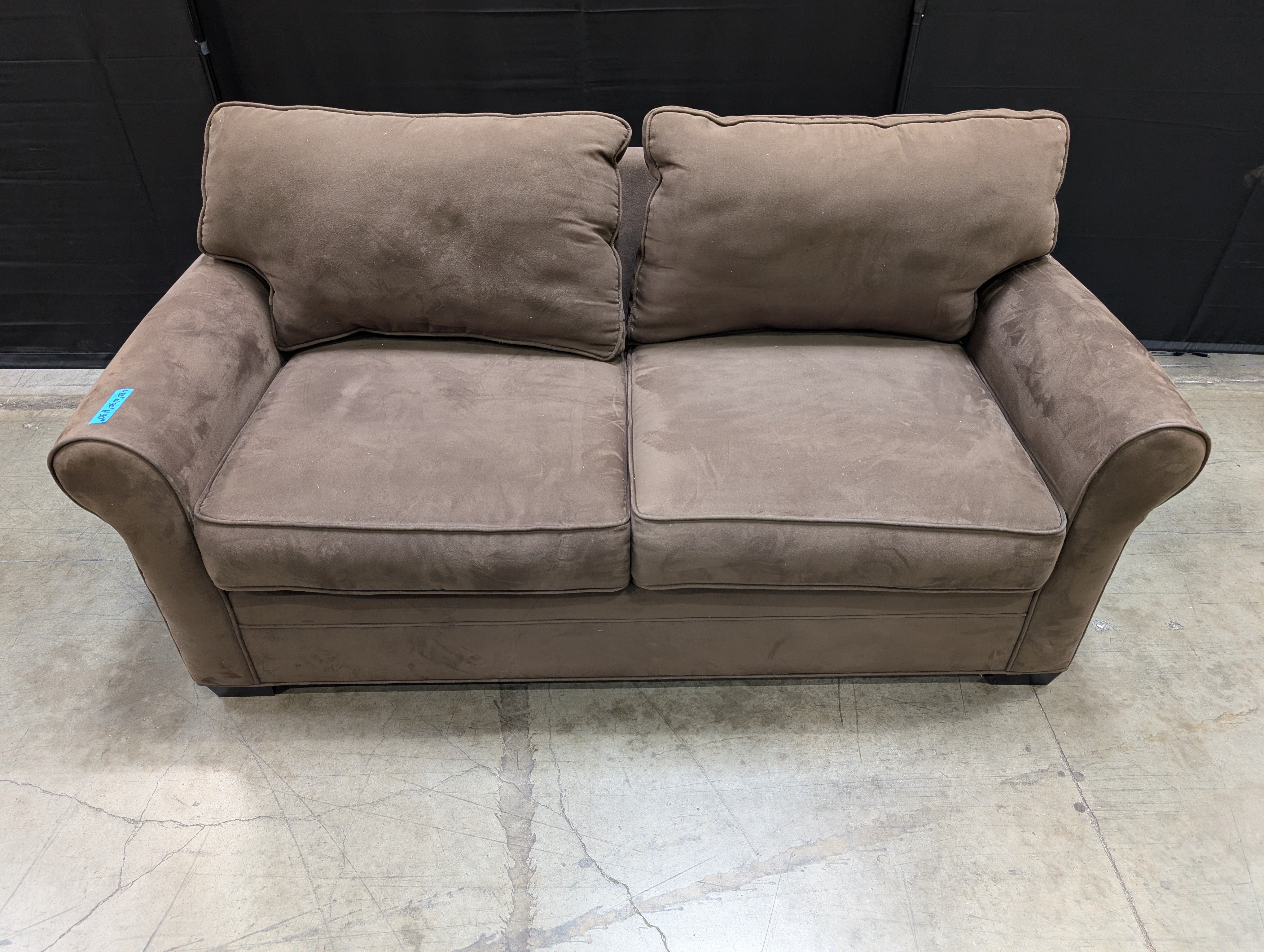 Plush Brown Two-Seater Sofa with Rolled Arms