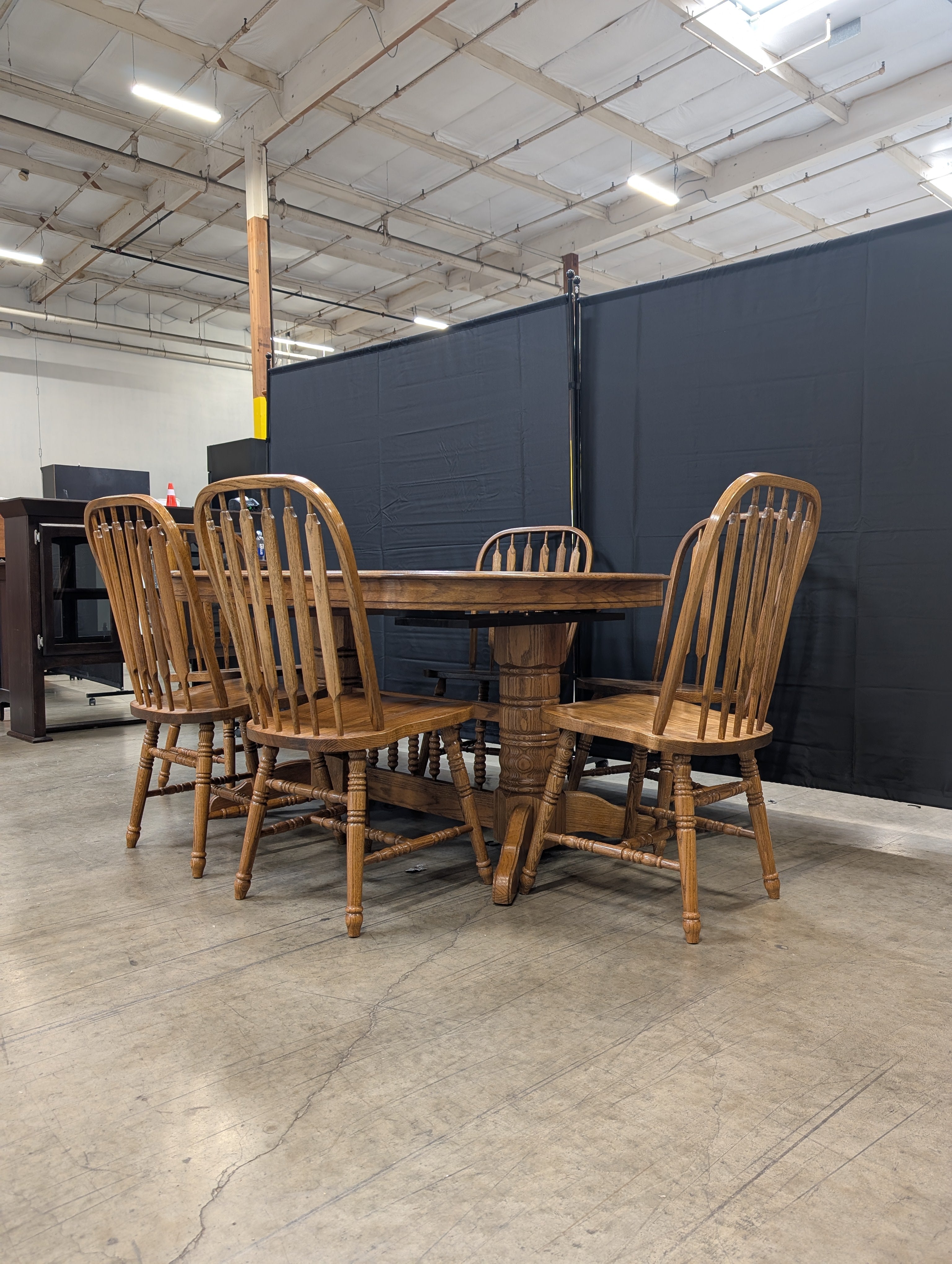 Oak Finish Dining Table with Six  Spindle Back Chairs