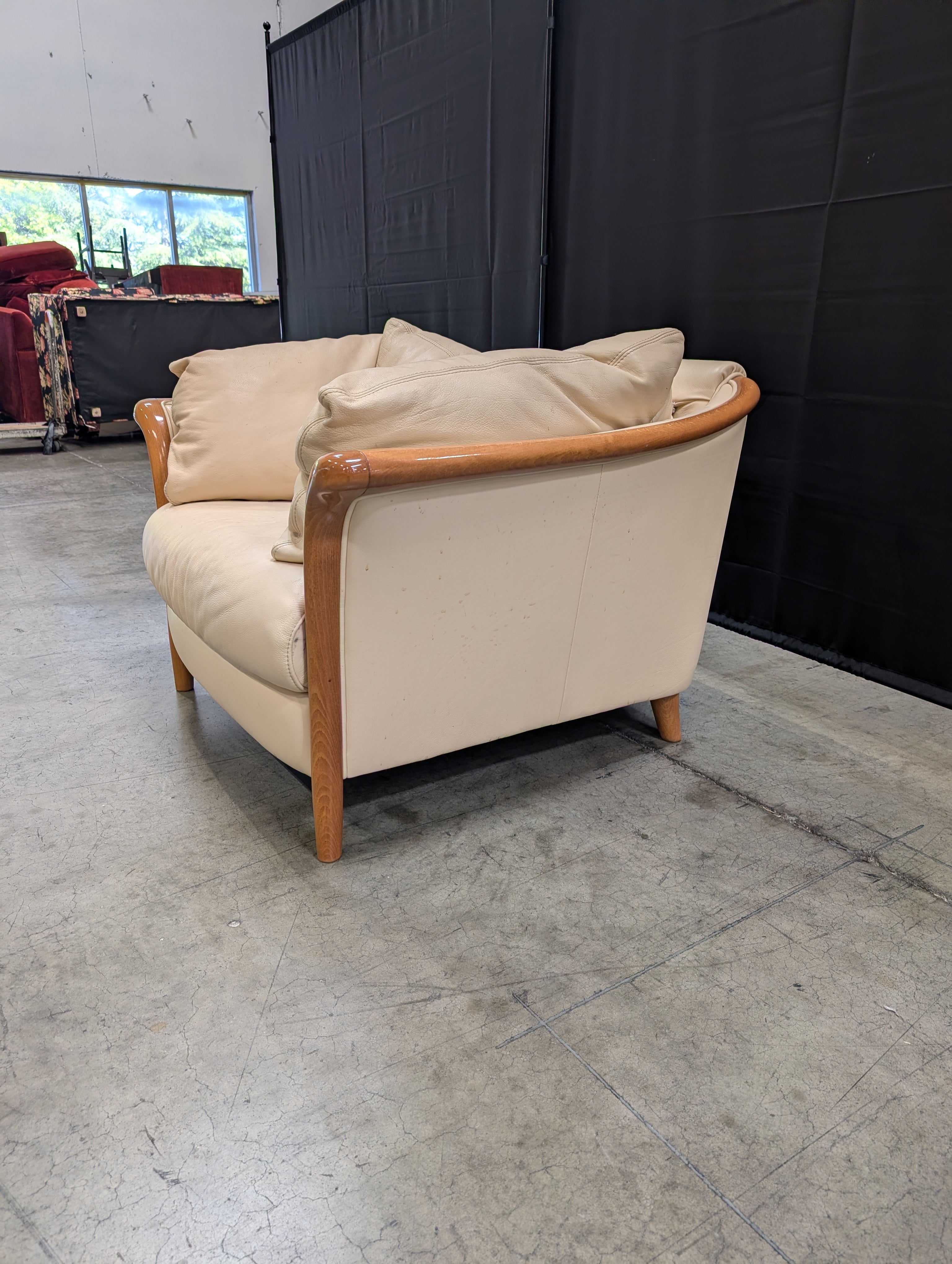 Beige leather Chair with Exposed Wood Frame