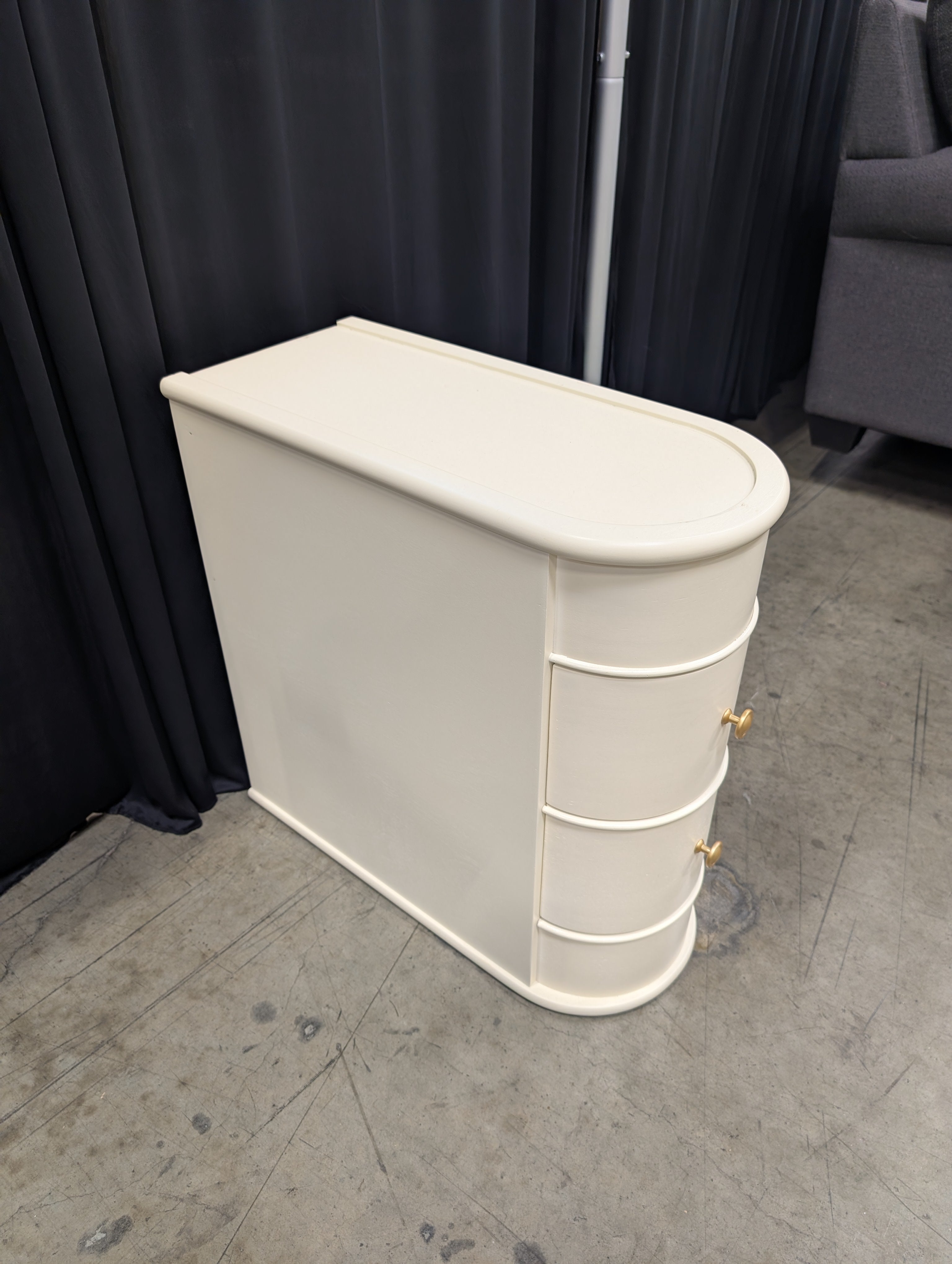 Cream Curved Two-Drawer Nightstand with Gold Knob