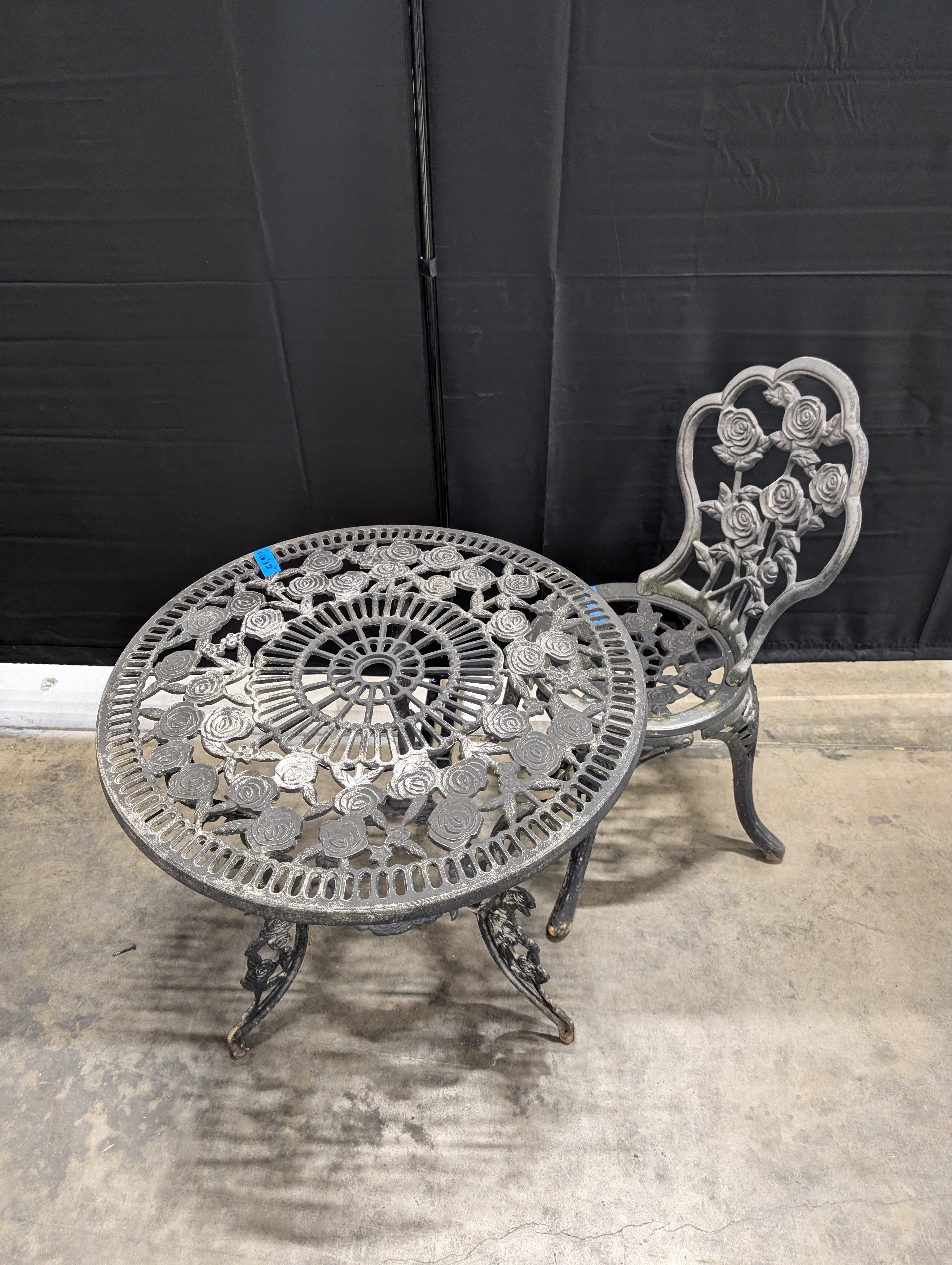 Round Black Cast Iron End Table with Floral Pattern