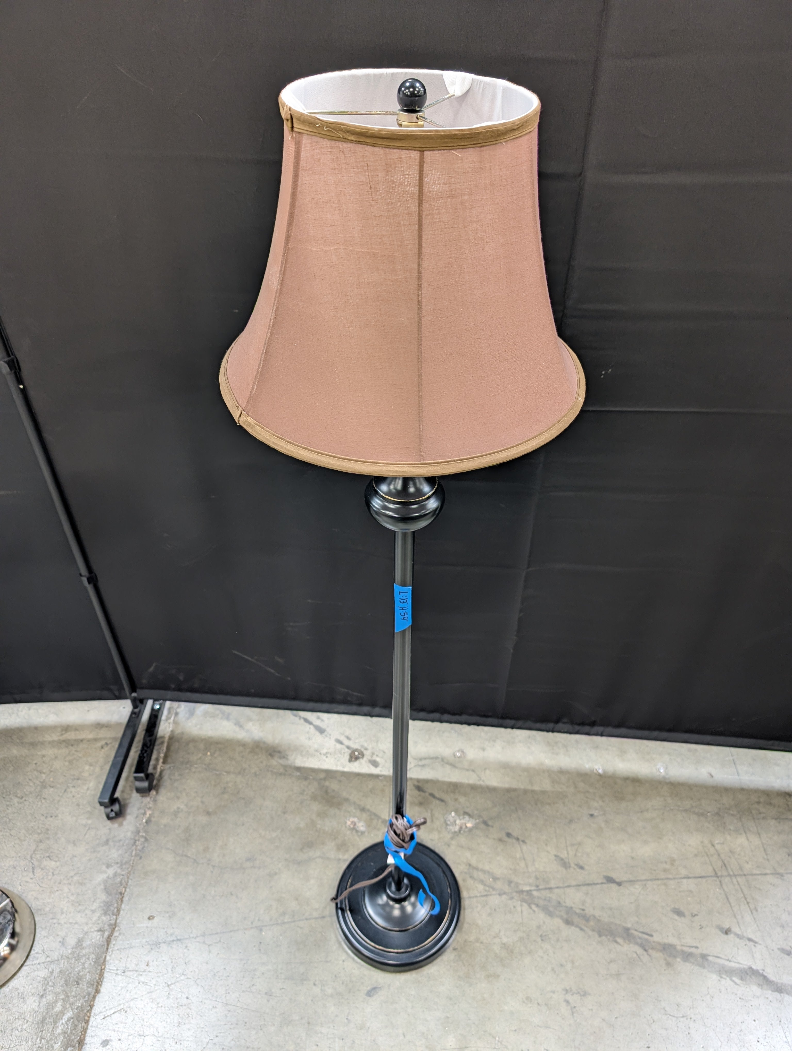 Traditional Black Metal Floor Lamp with Tan Shade