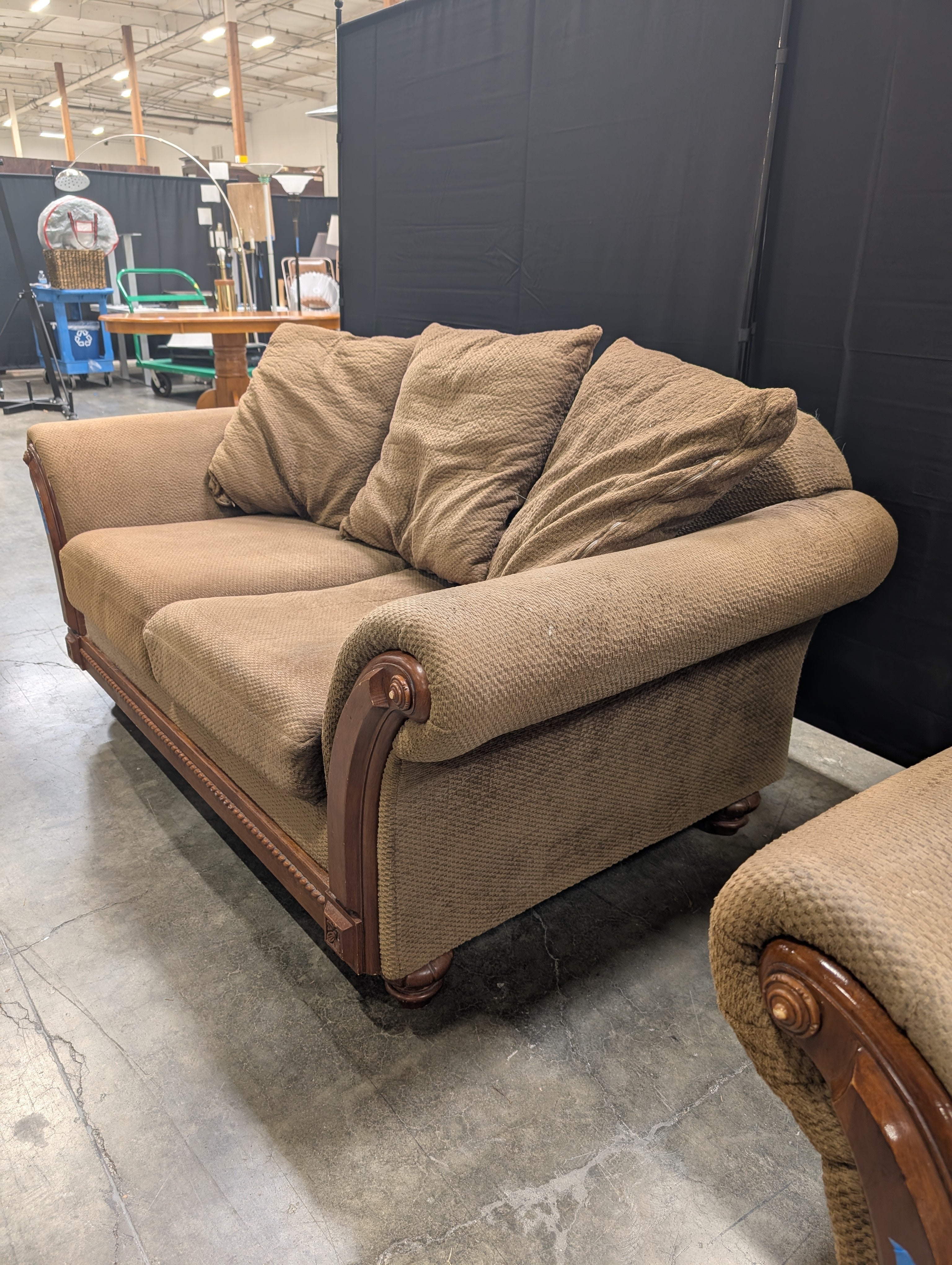 Brown Textured Fabric Loveseat with Wood Trim